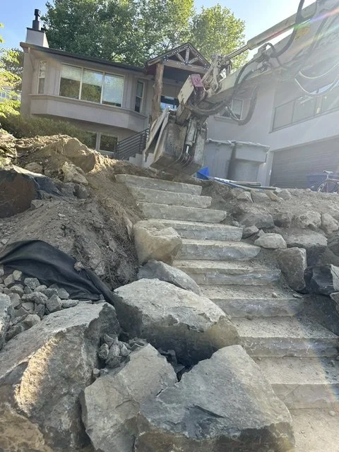 Granite steps with boulder retaining wall