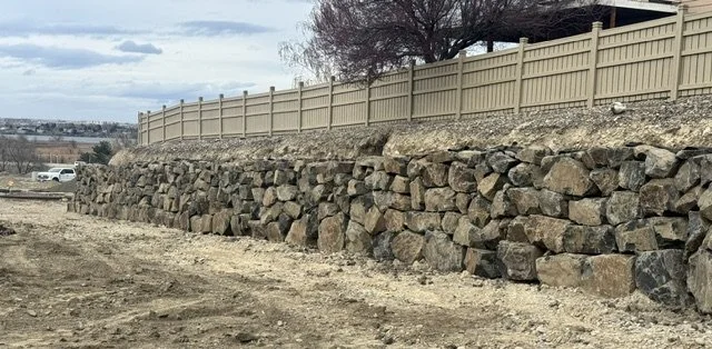 Inland Rockworks installs rock retaining walls for personal homes and businesses throughout Spokane, Tri-Cities and the Pacific Northwest.  (Walla Walla, Wenatchee, etc.)