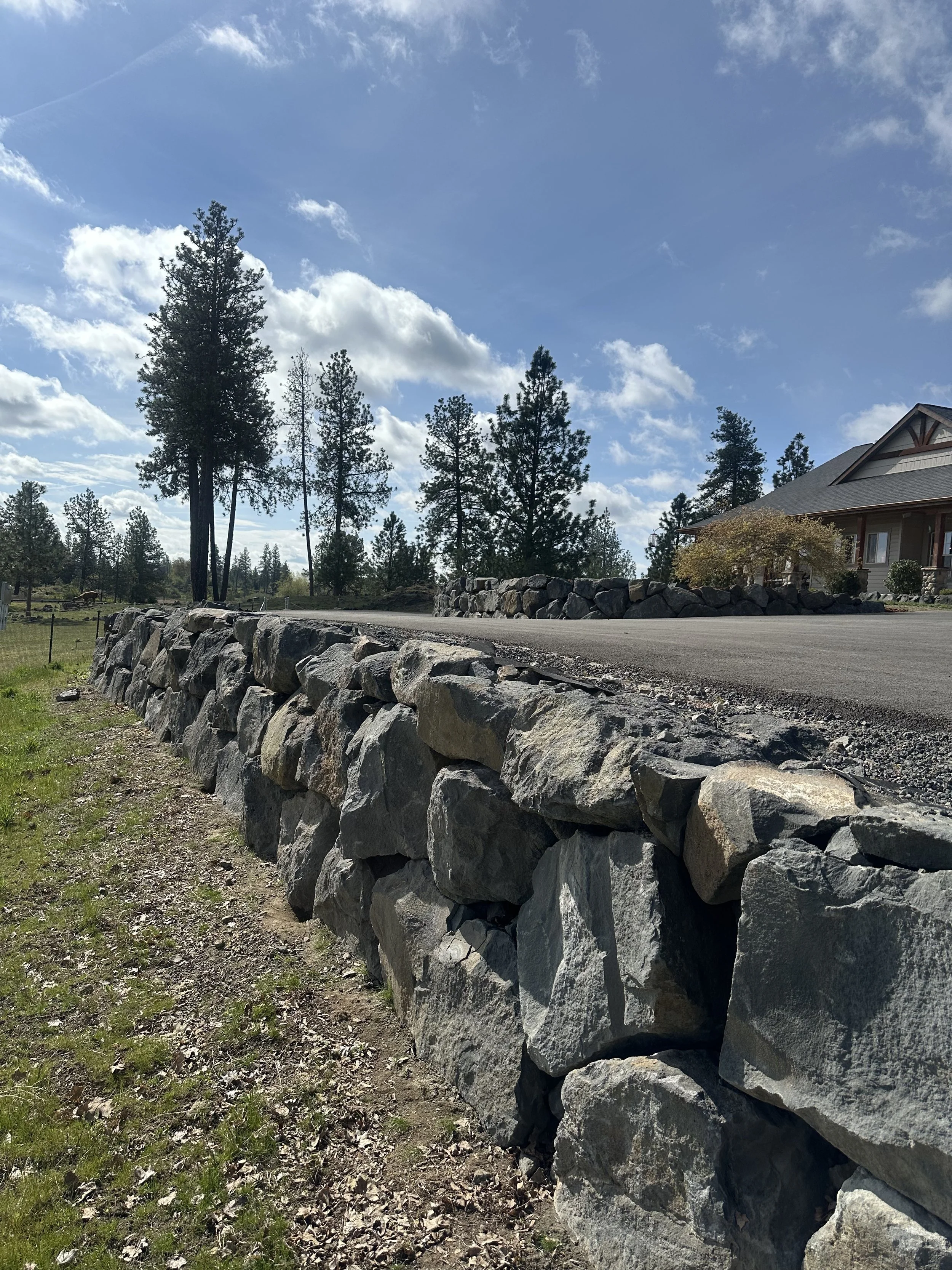Rock retaining wall