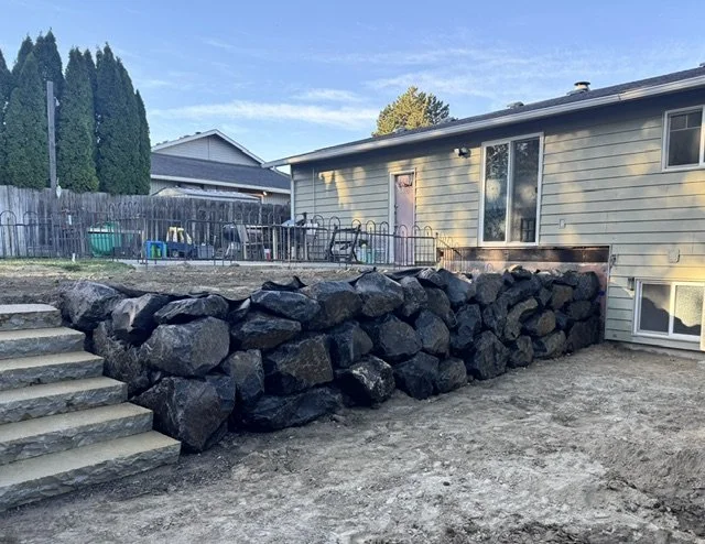 Granite steps with boulder retaining wall in Tri-Cities, WA