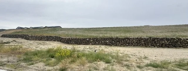 Inland Rockworks installs rock retaining walls for personal homes and businesses throughout Spokane, Tri-Cities and the Pacific Northwest.  (Walla Walla, Wenatchee, etc.)