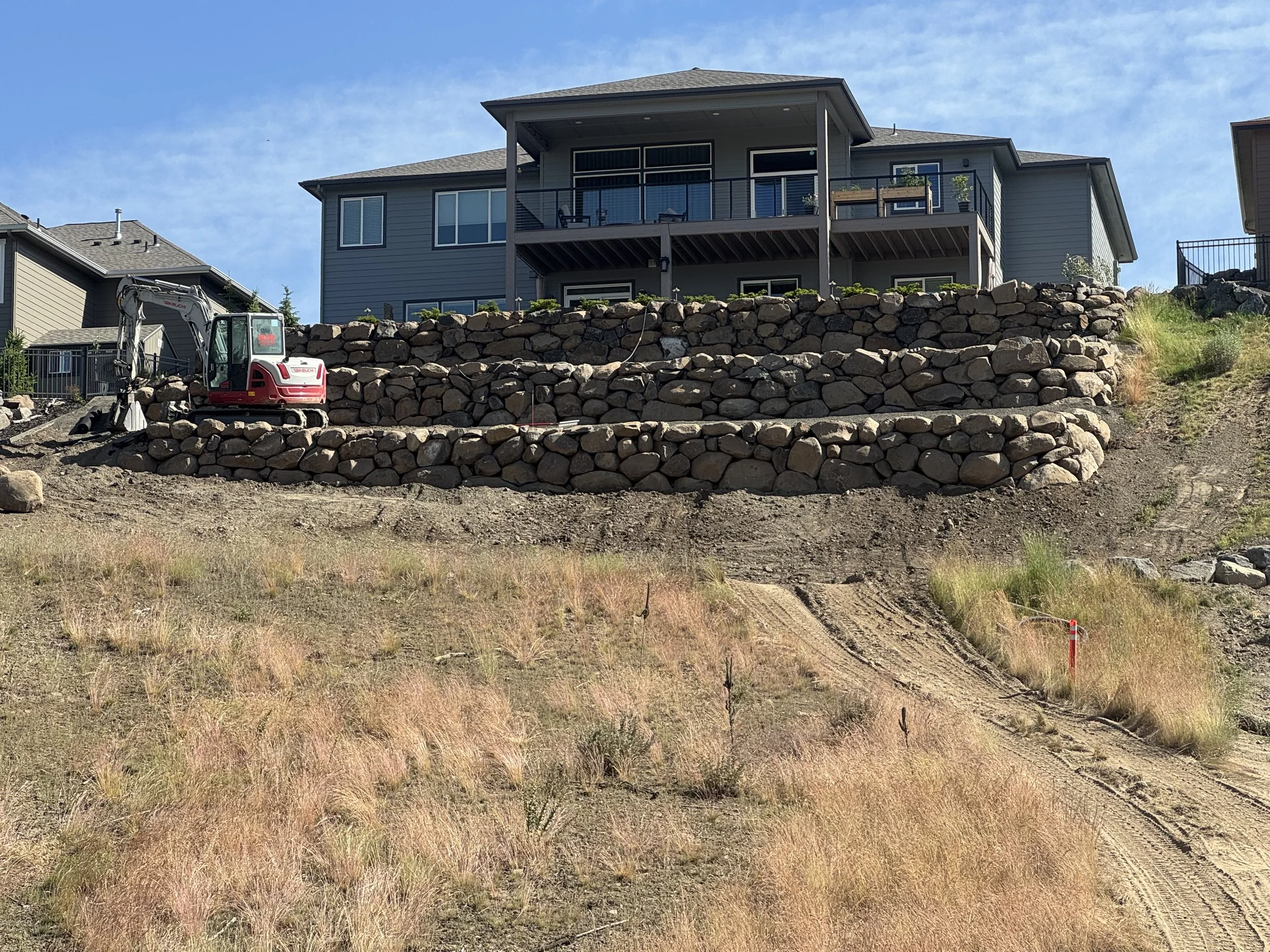 Terraced boulder wall