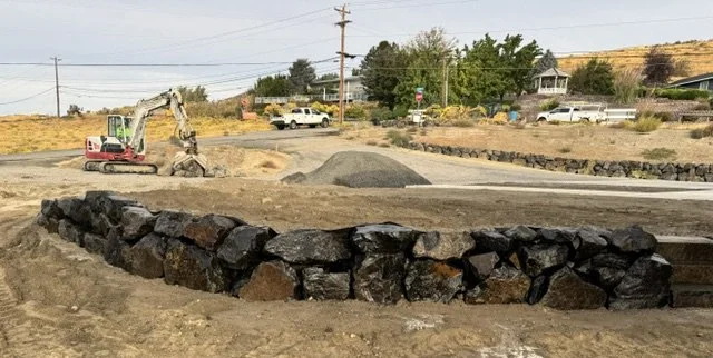 Large rock retaining wall