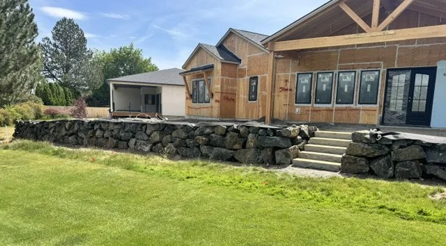 Inland Rockworks installs rock retaining walls for personal homes and businesses throughout Spokane, Tri-Cities and the Pacific Northwest.  (Walla Walla, Wenatchee, etc.)