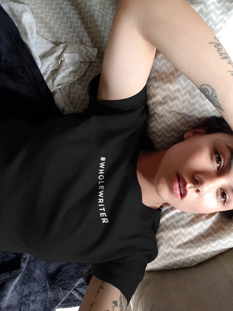 selfie-mockup-of-a-woman-wearing-a-round-neck-tee-on-her-bed-a17011.png