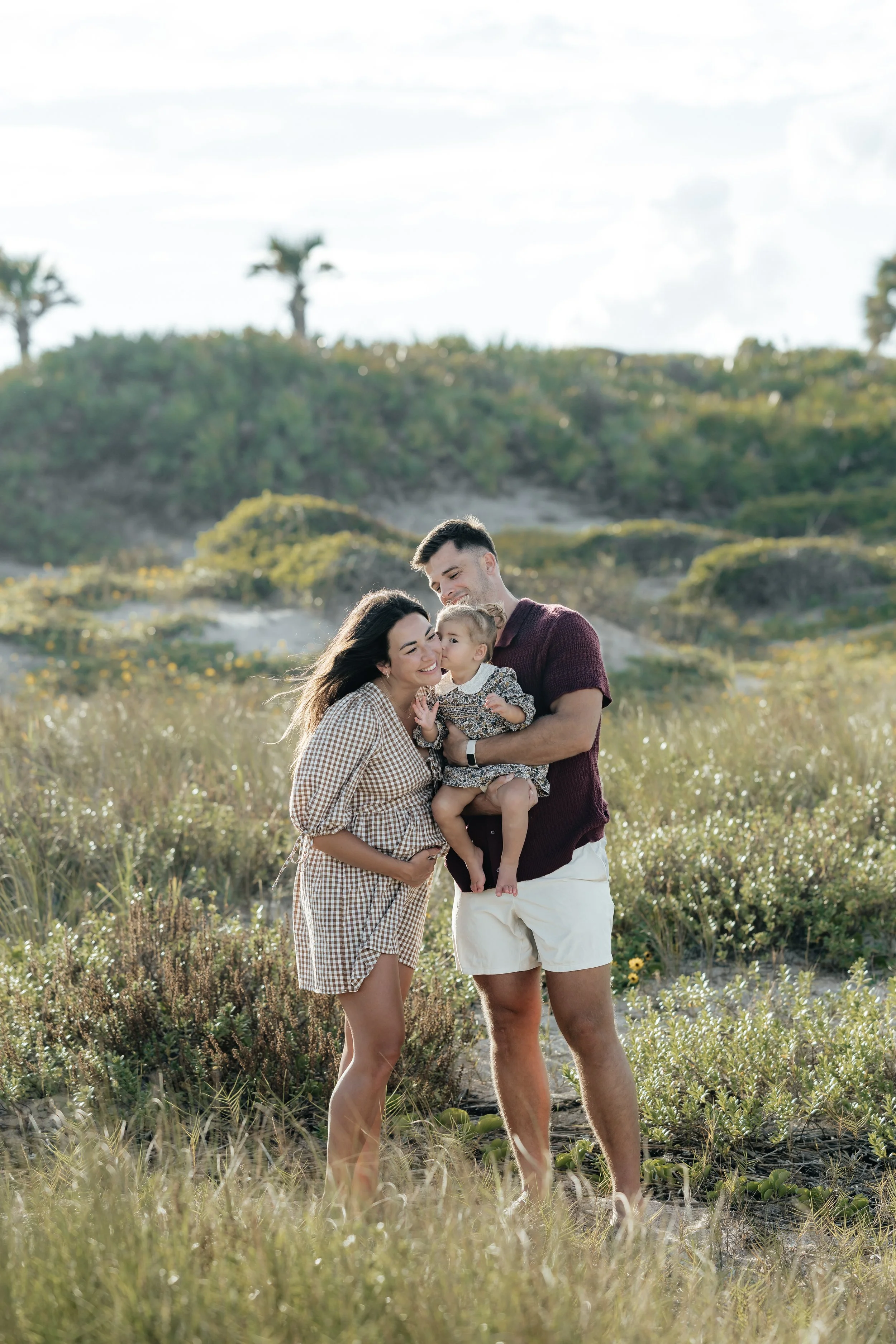 small female child walking on the beach in jacksonville florida