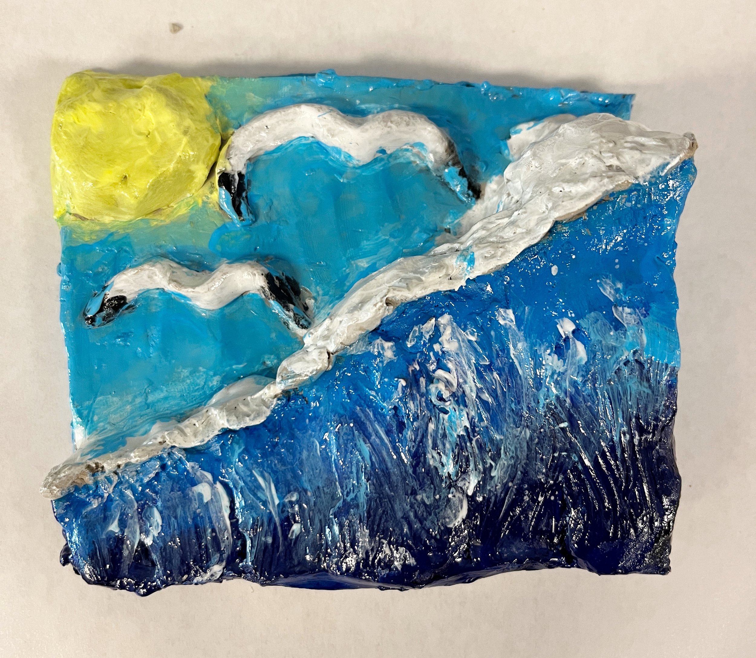 Clay relief sculpture