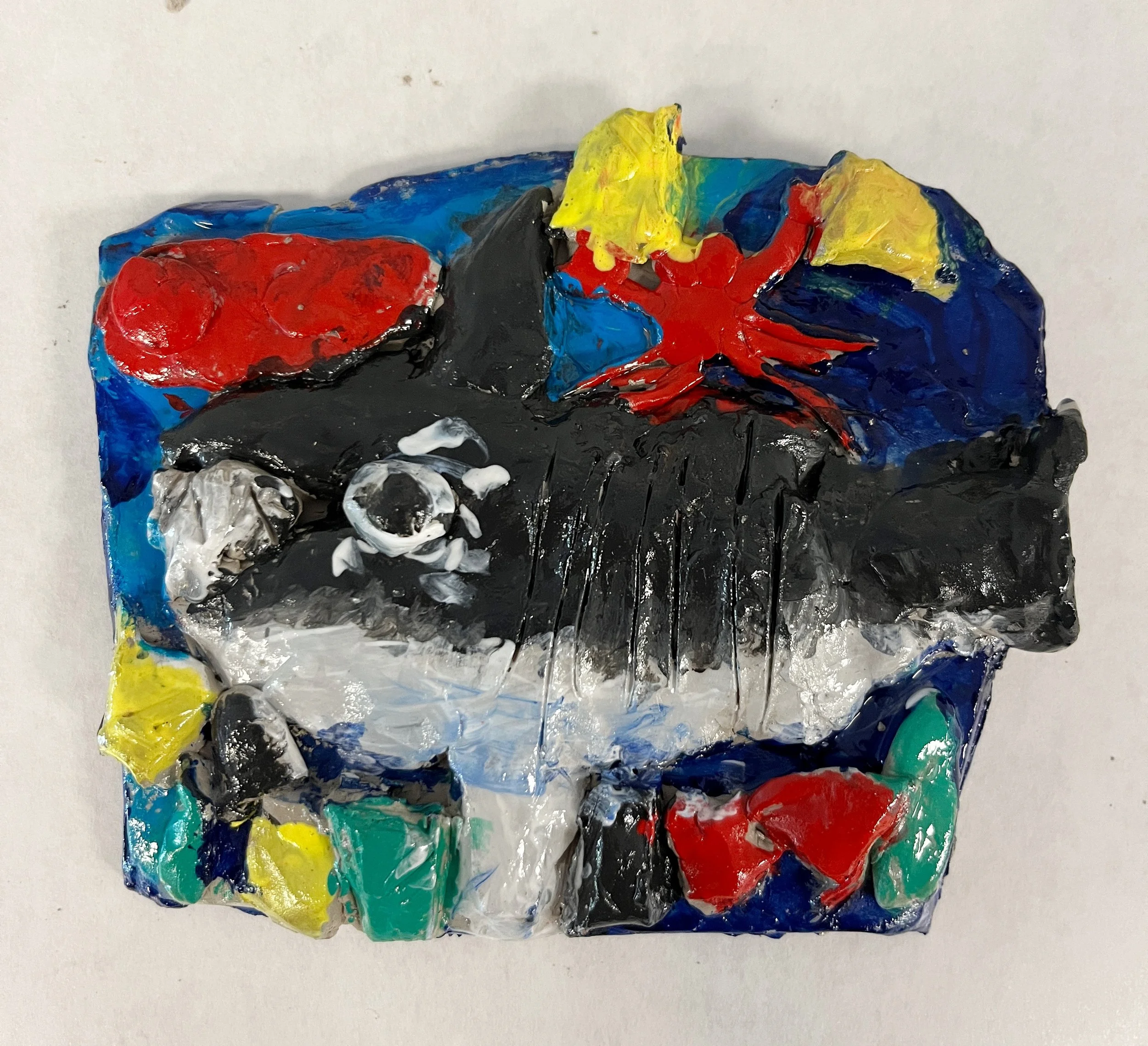 Clay relief sculpture