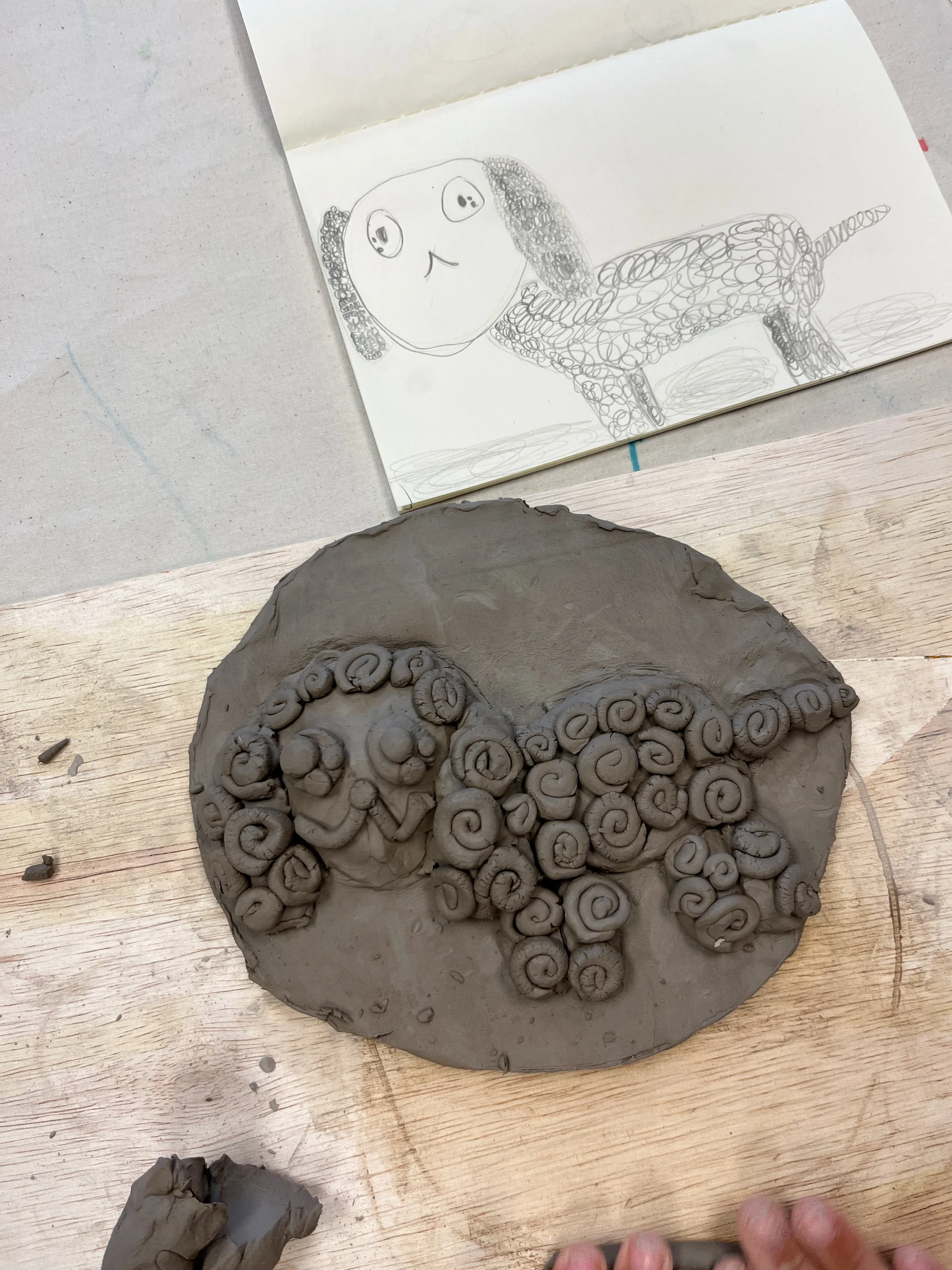 Clay relief sculpture