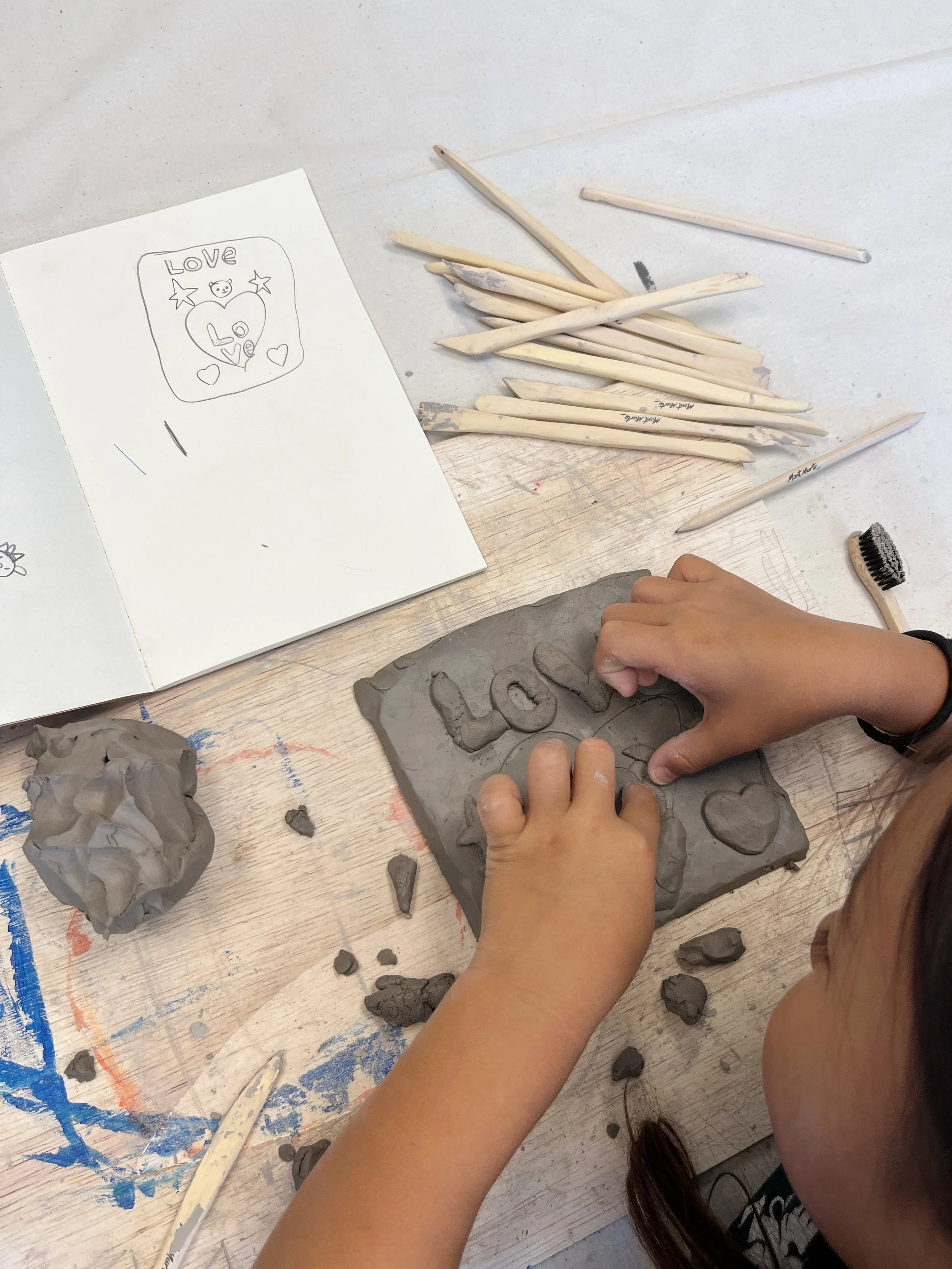 Clay relief sculpture