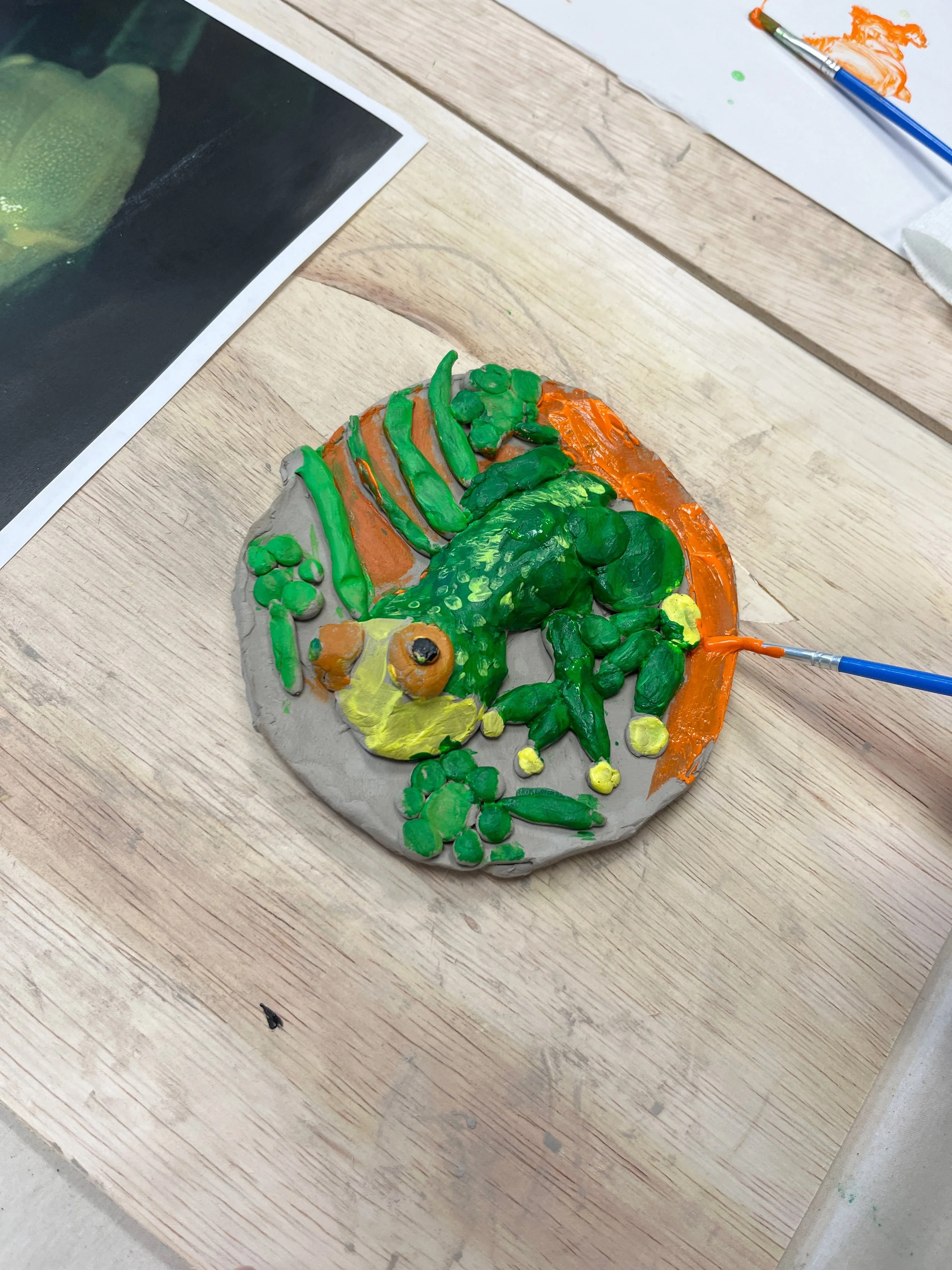 Clay relief sculpture