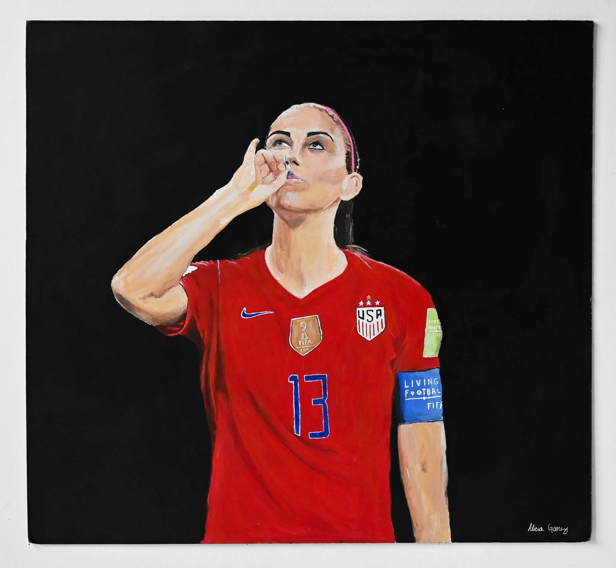 Painting of athlete Alex Morgan kissing her hand.