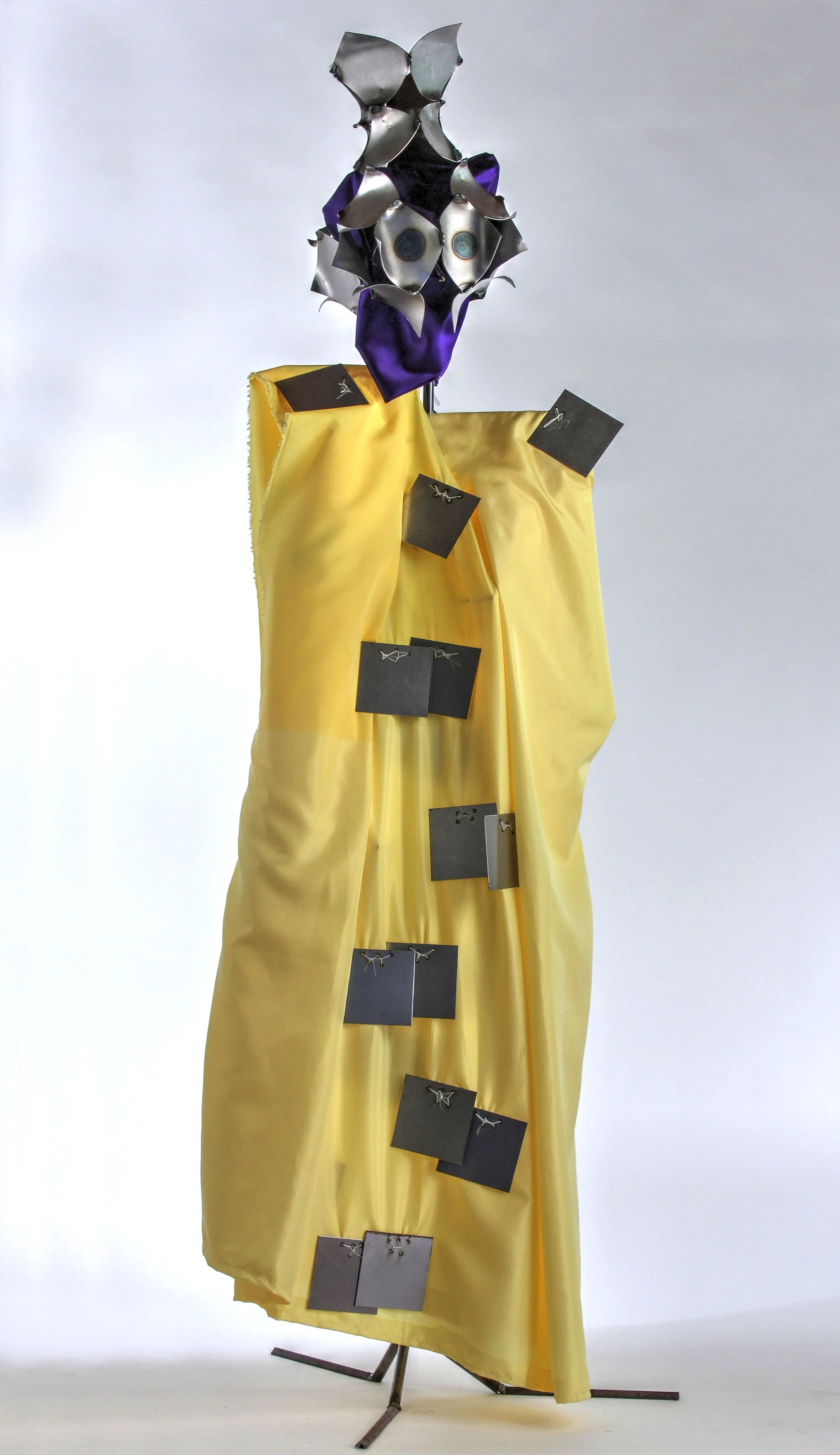 Deer in the Taillight
2'6" x 6'6" x 2'6"
TIG-welded mild steel helmets, hand sewn fabric robes
2015