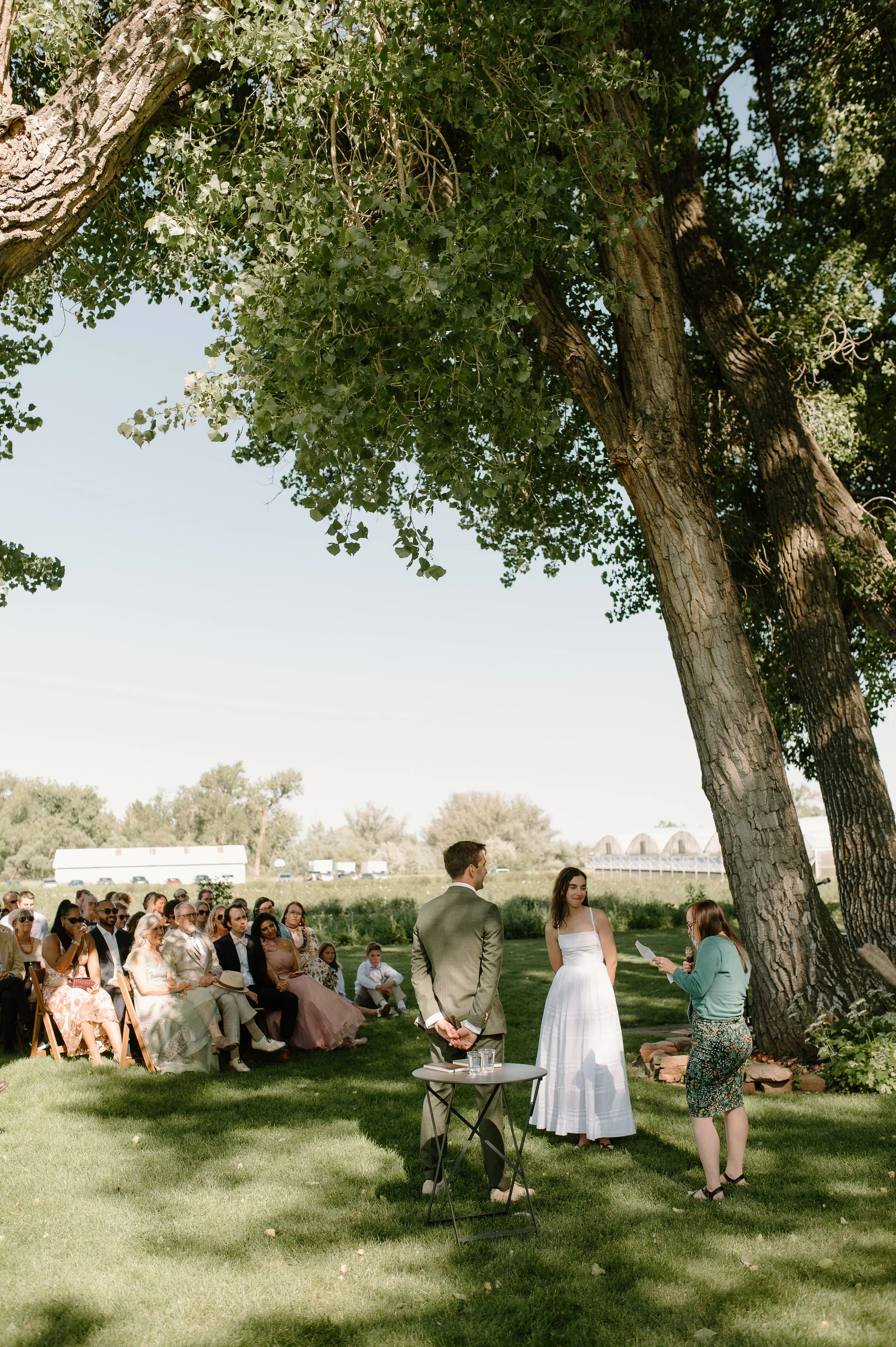 bride and groom standing at their wedding altar at Boulder Flower Farm