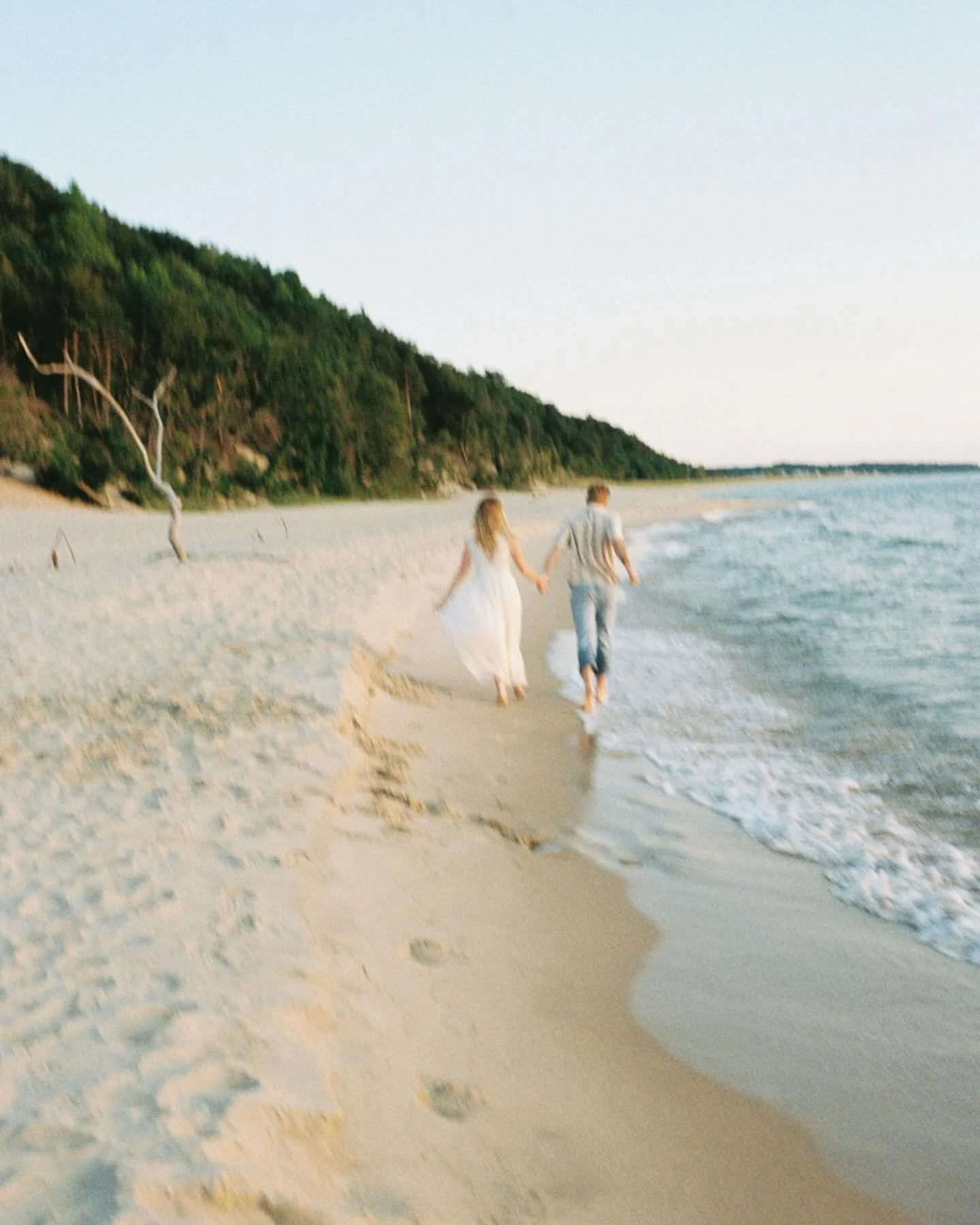 The warmth of this incredible day with D &amp; J on film is my favorite✨🌊🌞 We soaked up every last golden drop of summer sun&mdash;until lavender, blue, &amp; pink gradients of dusk spanned around us and the last light began to slip away. We hiked 