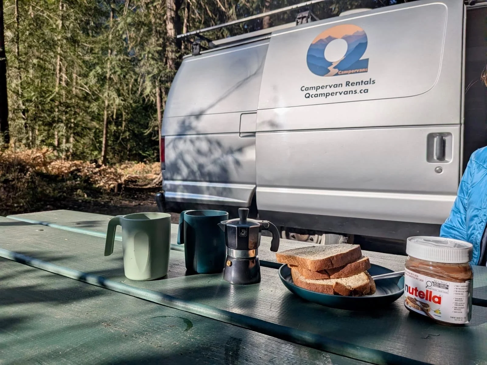 Morning breakfast outside a campervan rental