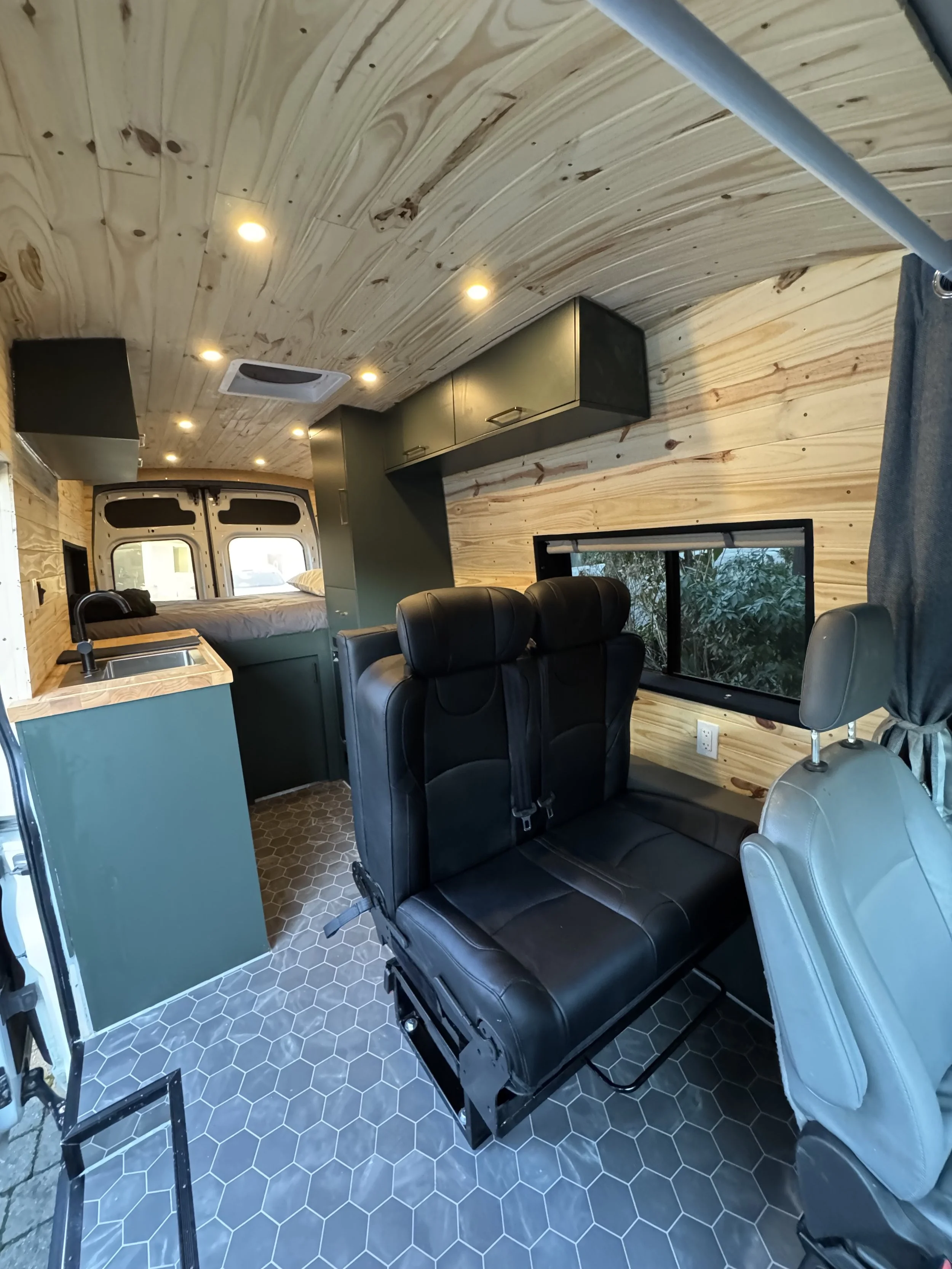 A family campervan that seats and sleeps 4 people with cozy interior