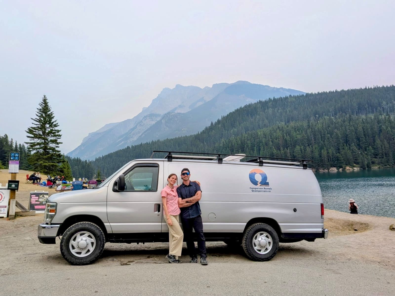 Campervan rental, Ford E-350 with renters at Two Jack Lake, Banff
