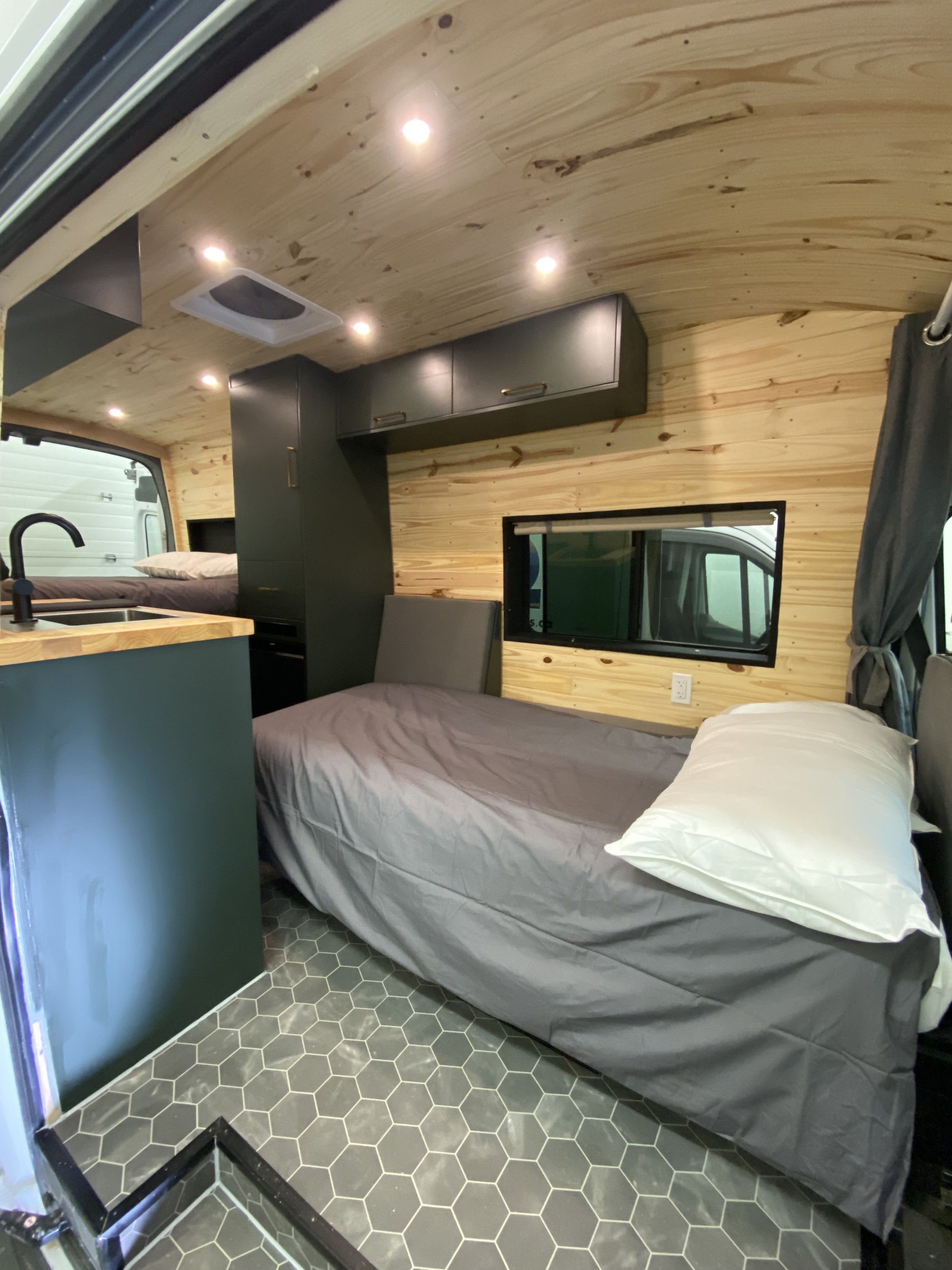 Family campervan where the seats fold down into a bed