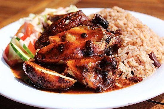 Traditional Jamaican cuisine served at a local restaurant in Ocho Rios, Jamaica