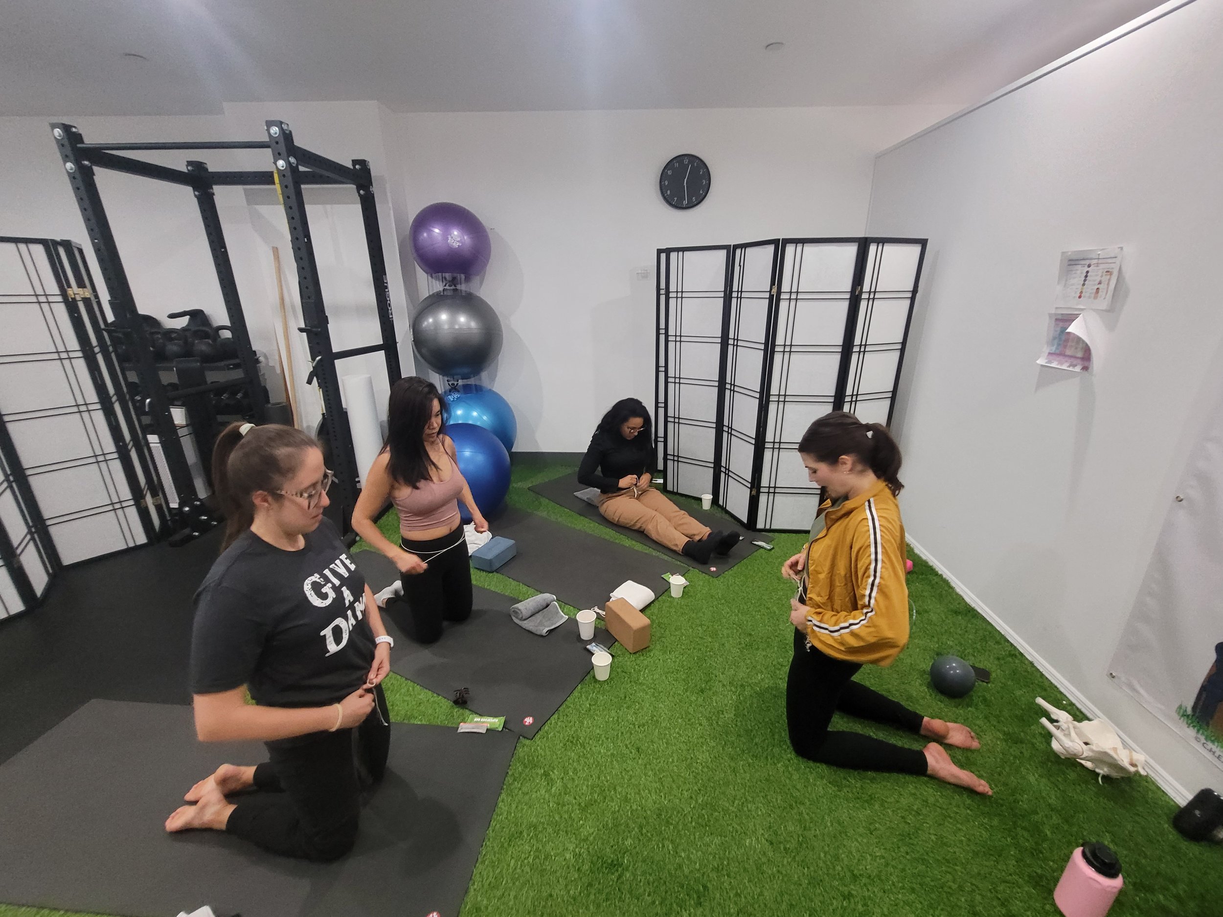 Woman leading group exercise, fitness, wellness class or workshop