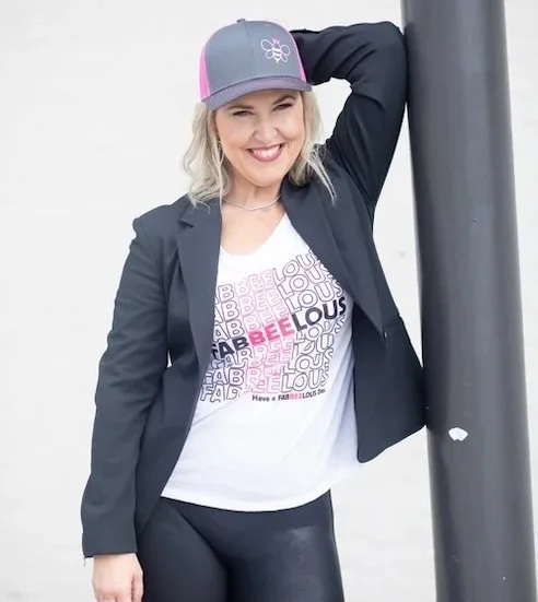 woman modeling fab-bee-lous T-shirt to support pollinator research and non-profits