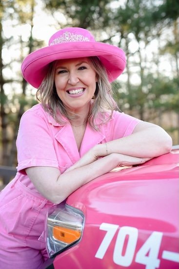 woman in pink jumpsuit and pink hat