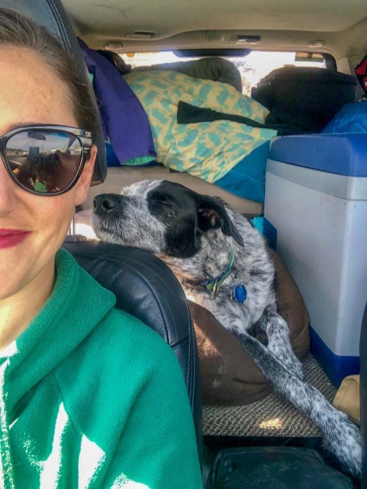 emily-and-jude-relaxing-in-the-car-subaru-camper-two-dusty-travelers.jpg