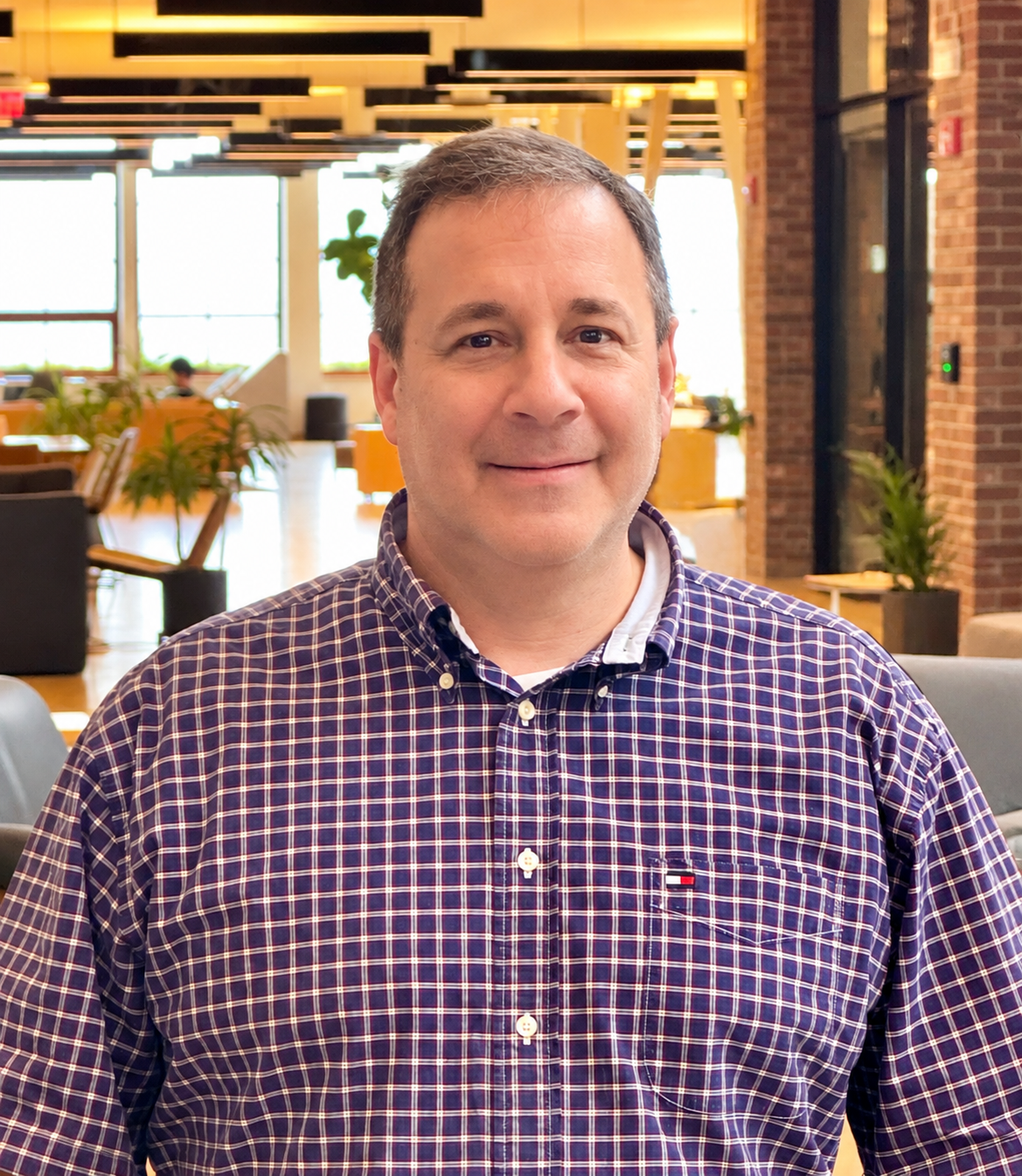 Man smiling in office