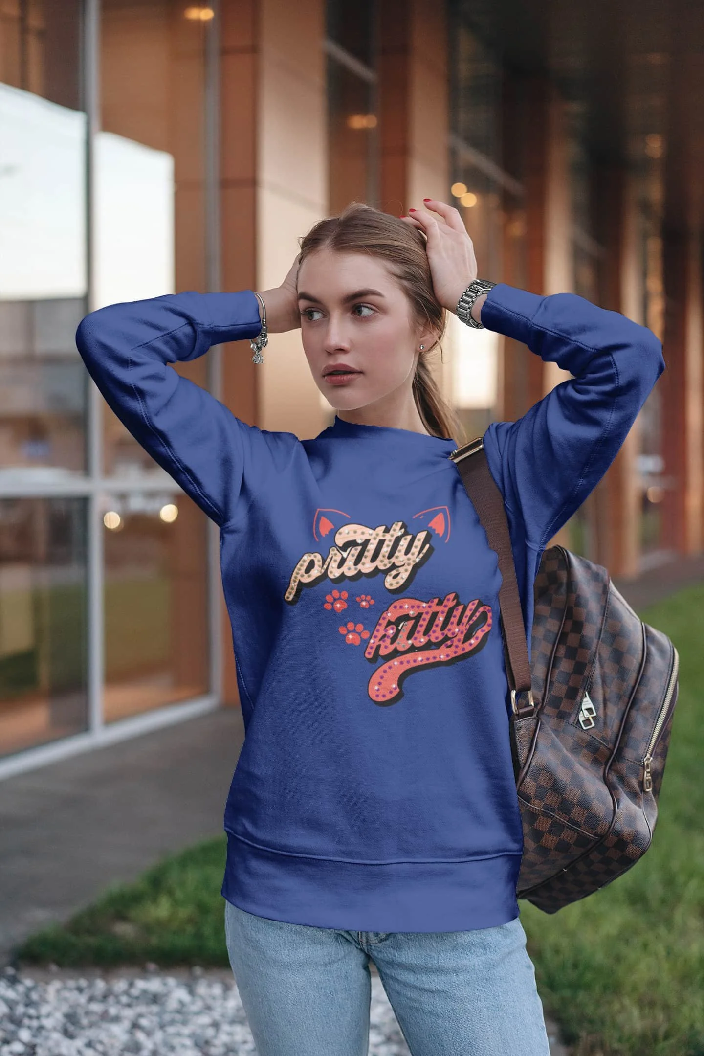 True Royal blue Pretty Kitty sweatshirt mockup of a woman with her hands on her head @jellybzz.com