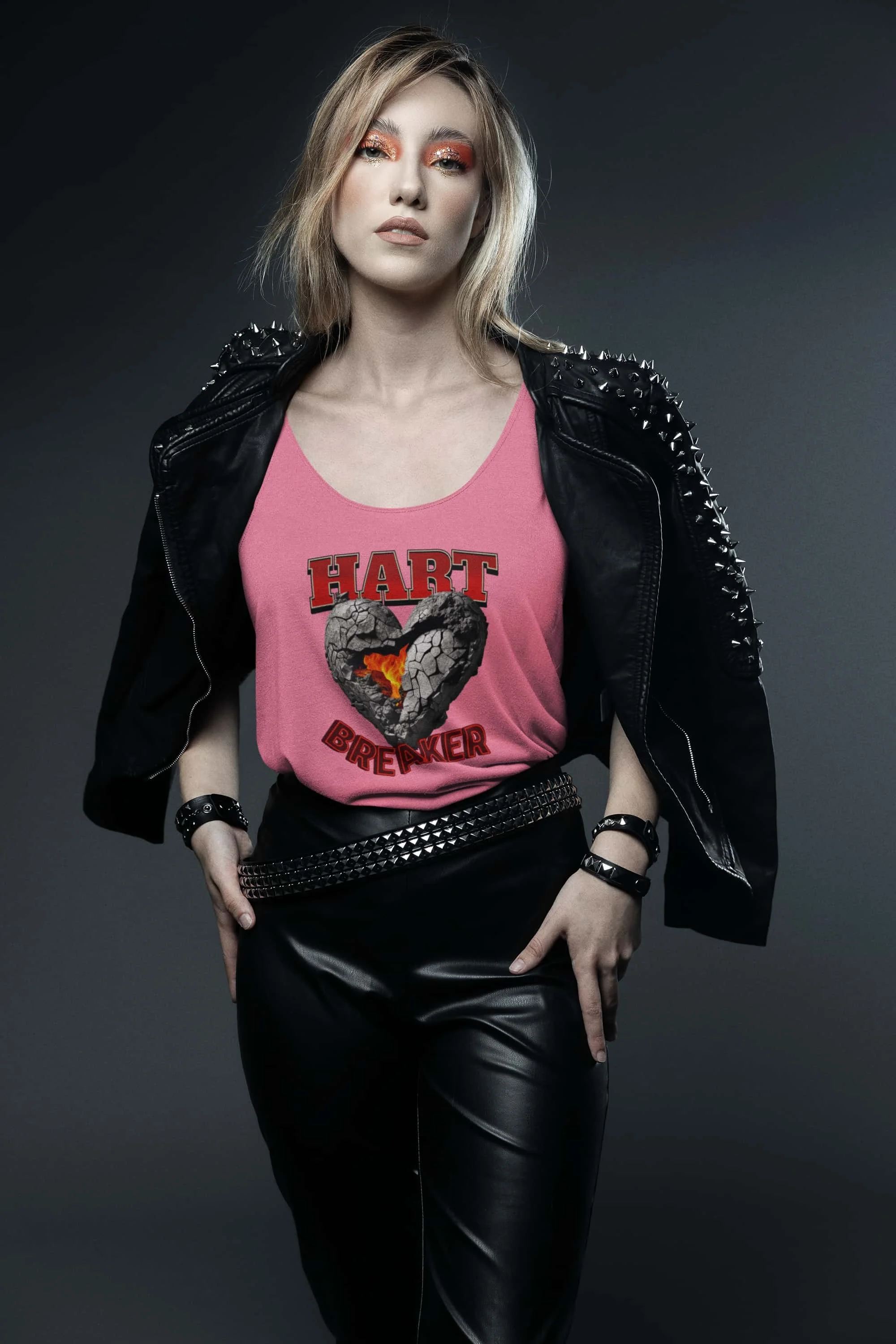 Charity Pink Heart Breaker tank top mockup of a woman wearing a glam rock inspired leather jacket @jellybzz.com.