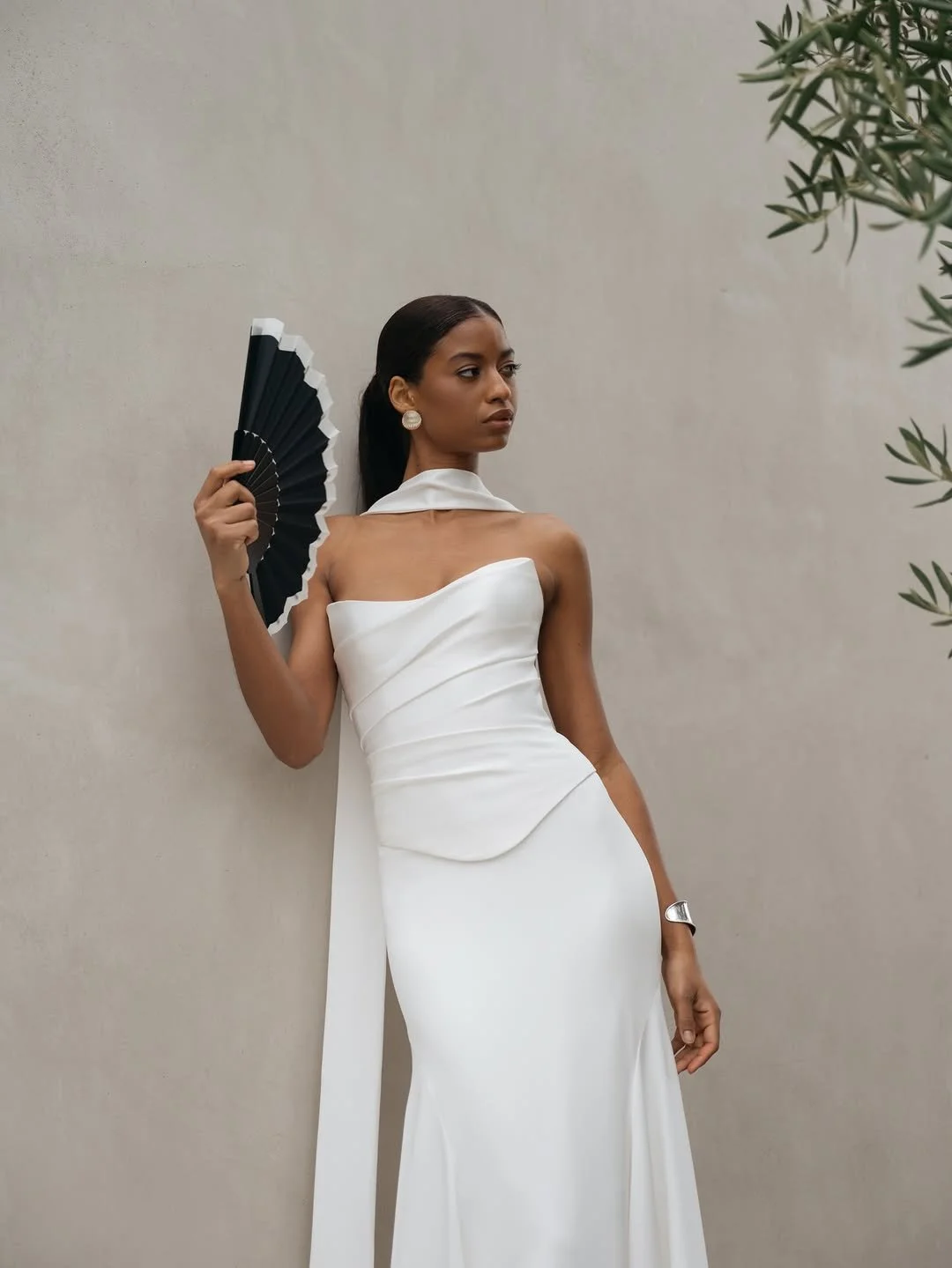 Jenny Yoo Bridal Alora Gown. Sleek, chic, timeless, the Alora gown is a show stopper. Alora is in stock at Halo and Wren.
