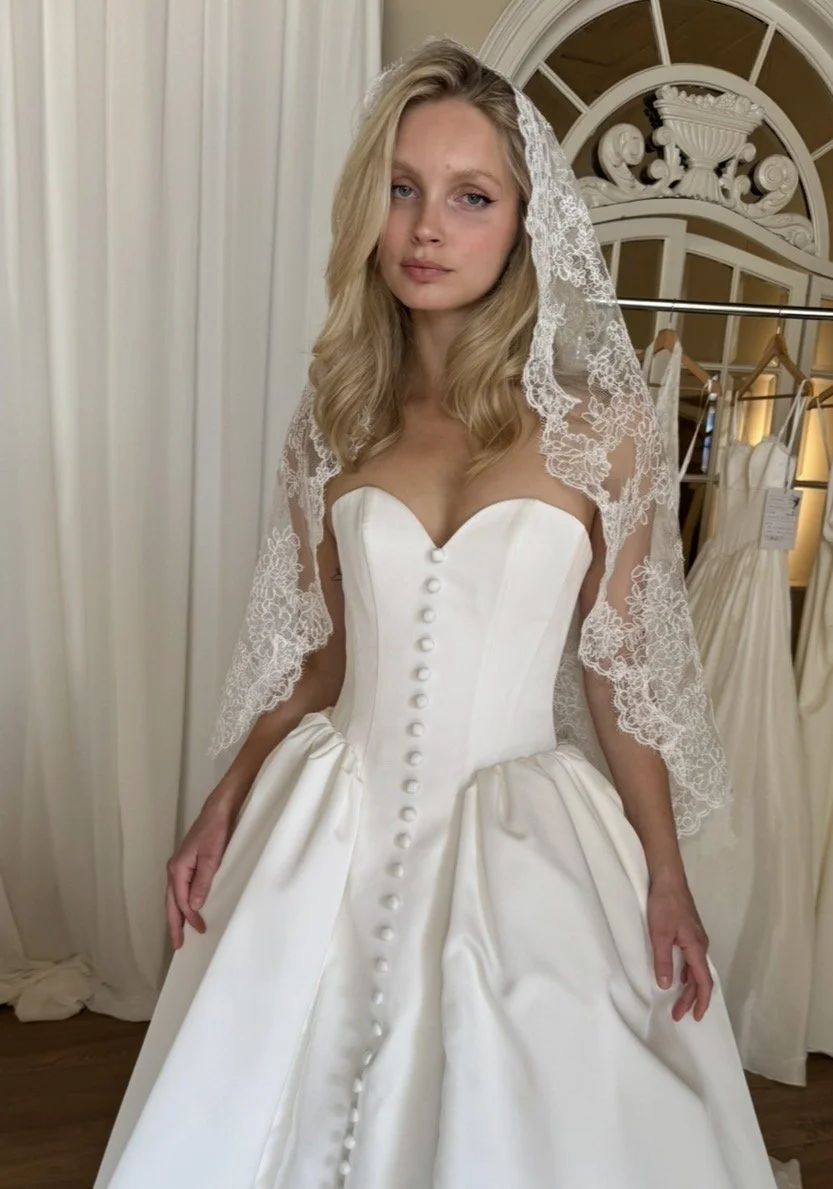 The MWL Rue is a modern bridal masterpiece with historically placed structure and boning to create a truly unique and unforgettable bridal look. Mikado is used to create structured boning and a sweetheart neckline create a sculpted, feminine silhouet