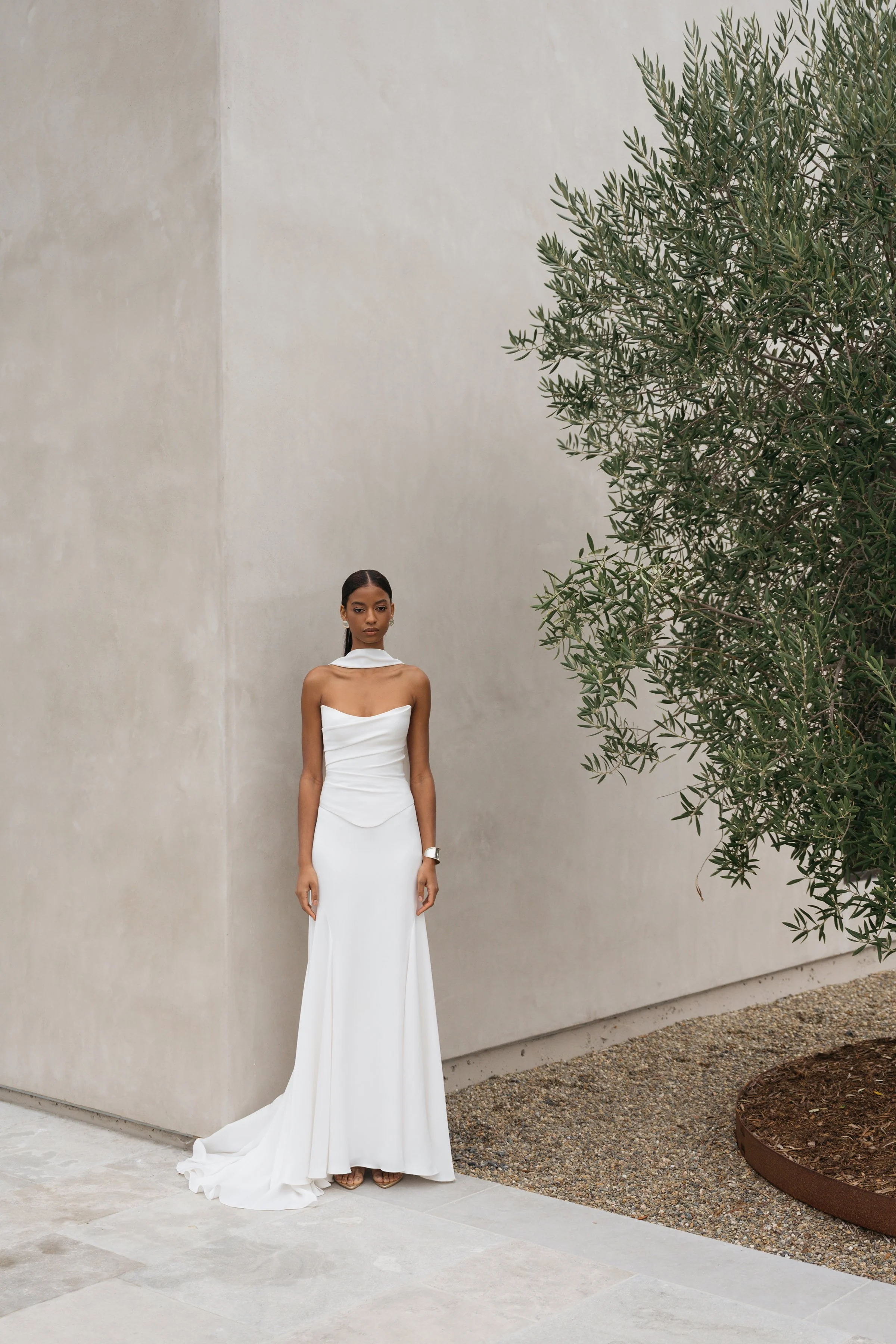 Jenny Yoo Bridal Alora Gown. Sleek, chic, timeless, the Alora gown is a show stopper. Alora is in stock at Halo and Wren.