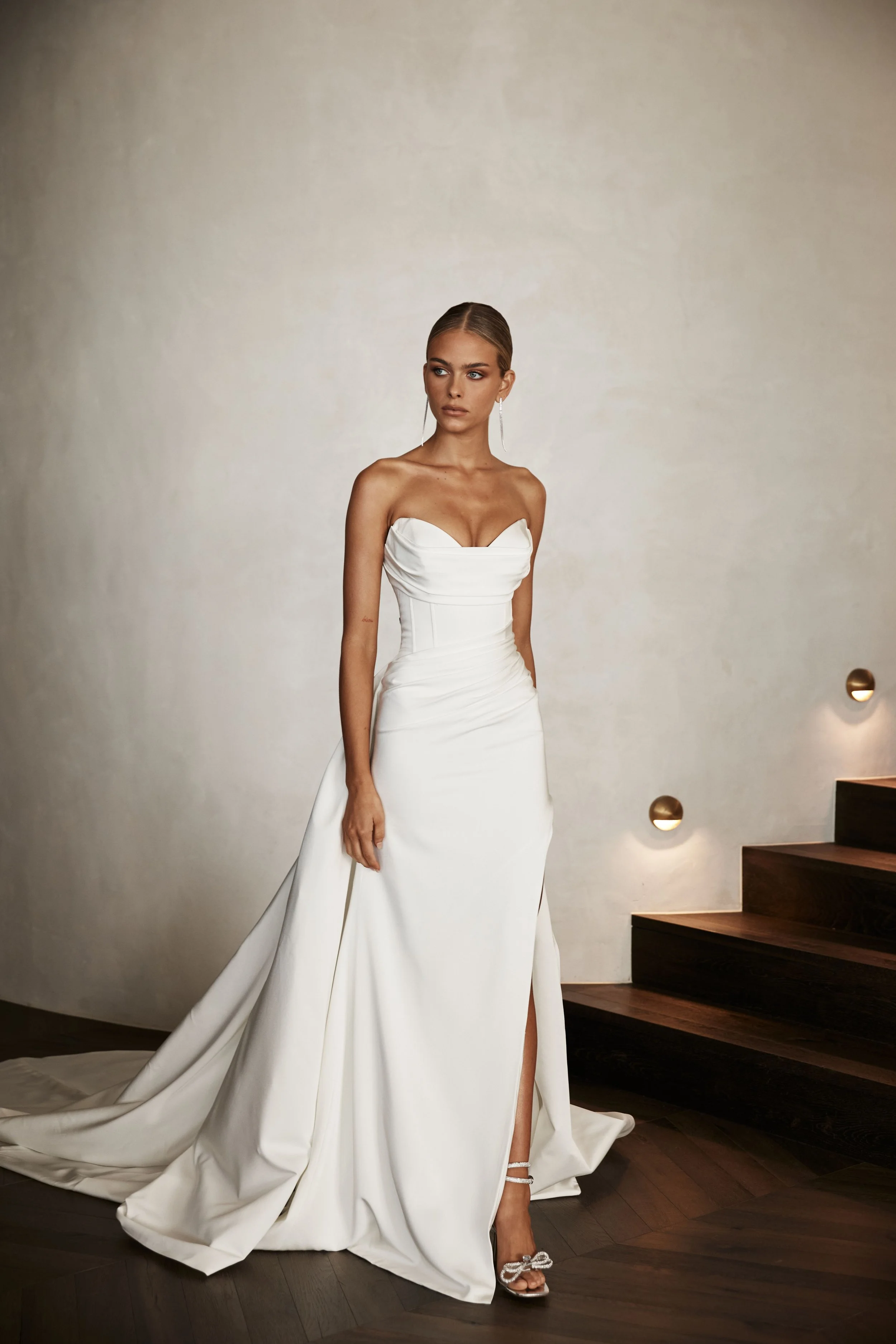 Jane Hill Bridal Huntleigh it’s Huntleigh’s world and we’re just living in it! Jane Hill’s best seller for a reason, the Huntleigh gown encapsulates modern elegance and exudes sophistication. with her sweetheart detailed neckline, signature under bus