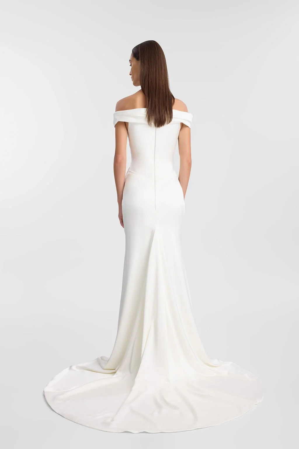Irreverent glamour takes the spotlight in KYHA Bride Nia. Cut from sleek double satin, Nia features a highly structured bodice with a tight drape and a fit-and-flare skirt cut to accentuate the silhouette. The draping graciously falls into a floor-sw