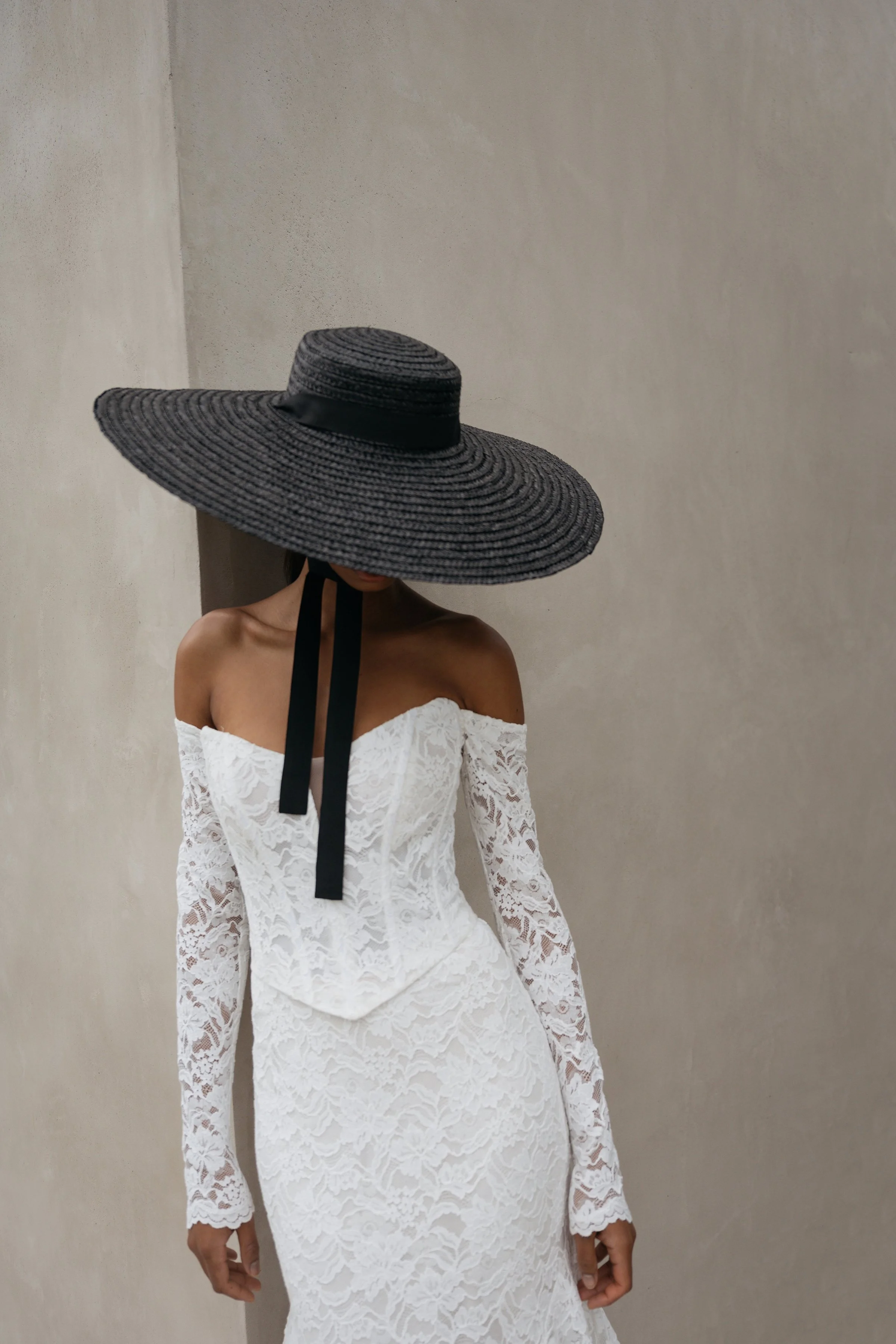 Jenny Yoo Bridal Natalie: The Natalie gown, cut in our beautifully detailed Finley lace, adds a romantic flare to an otherwise modern and sultry silhouette.