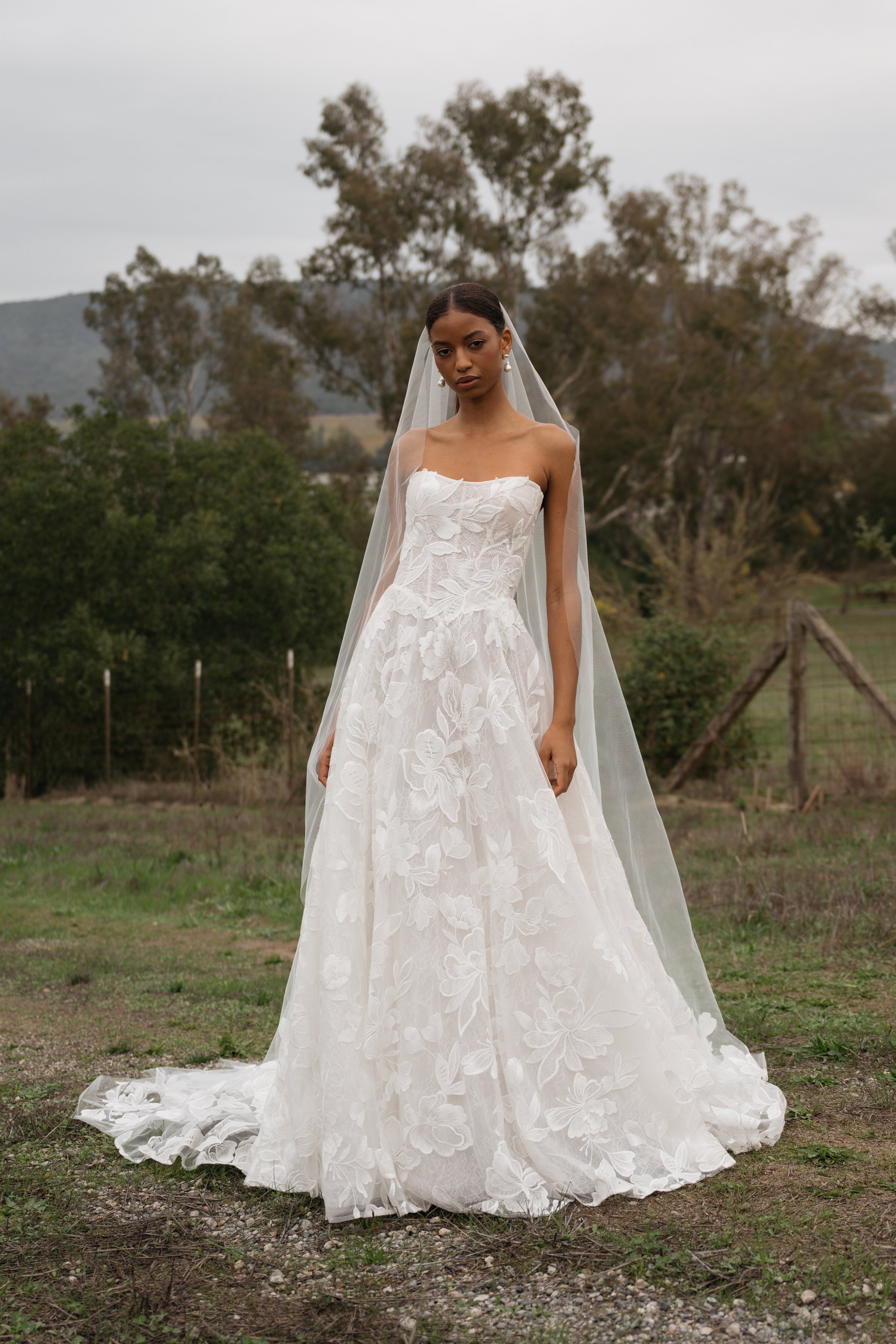 Jenny Yoo Bridal 'Gwendolyn' gown. Airy and romantic, with a beautifully structured corset bodice, the Gwendolyn gown is a feminine dream.