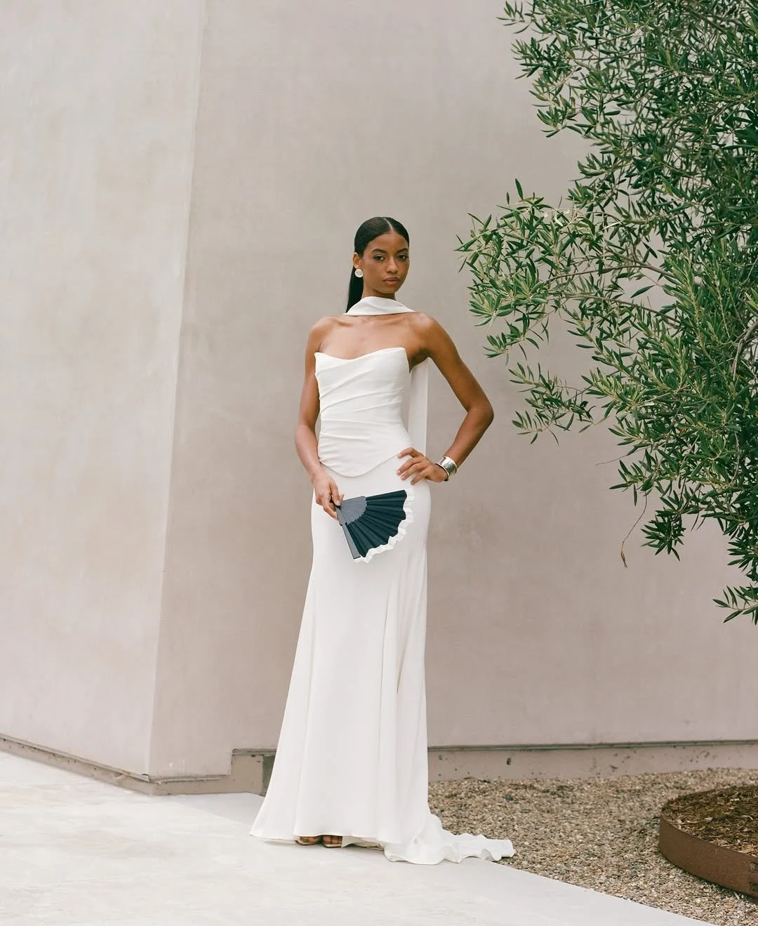 Jenny Yoo Bridal Alora Gown. Sleek, chic, timeless, the Alora gown is a show stopper. Alora is in stock at Halo and Wren.