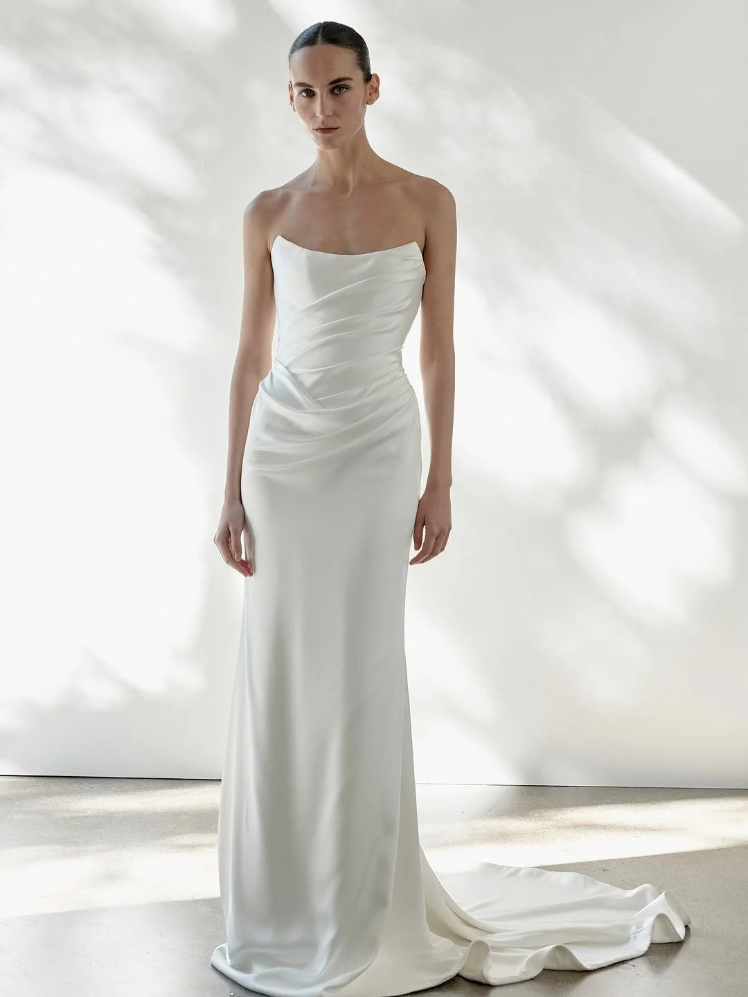 draping becomes an art form in KYHA Bride Iver. a structured, scoop neckline bodice cinches the waistline and a fit-and-flare skirt celebrates the female form. but the star of the showstopping KYHA Bride Iver is its draping. tight and directional acr