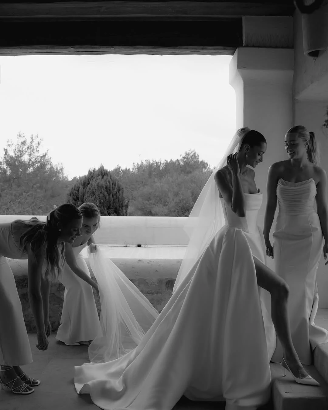 Be followed by a train of lustrous duchess satin every step you take with the KYHA Bride Milford Skirt. With a fitted waistband and full pleated skirt with a modern split, the Milford Skirt can be styled as an overskirt to raise the drama of any look