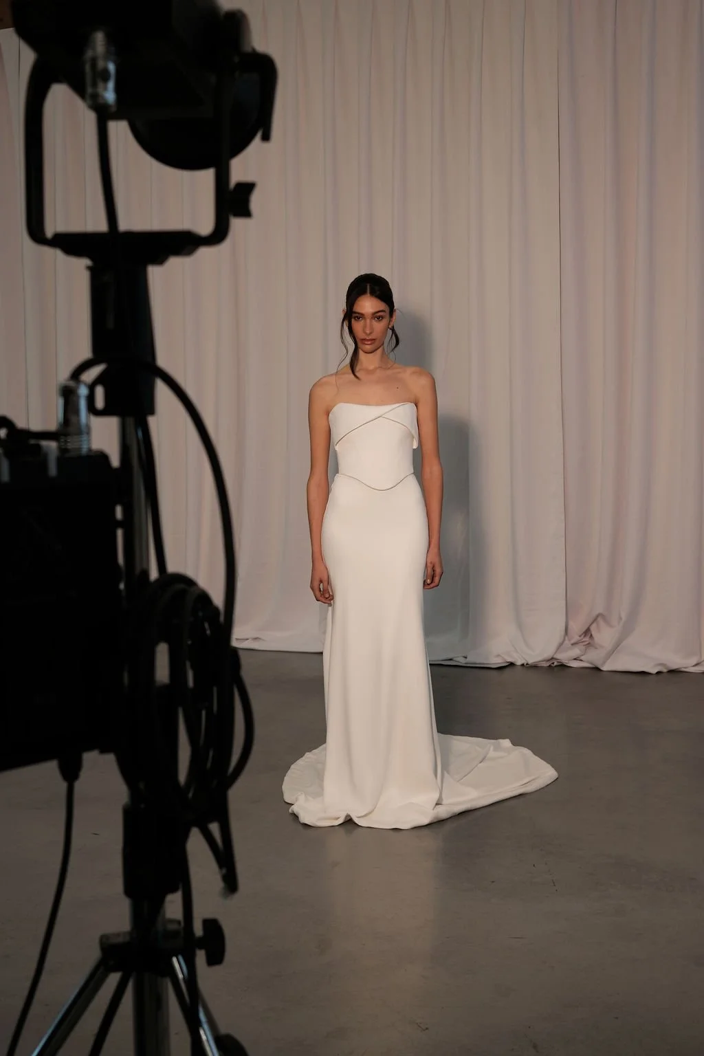 KYHA Bride Turner is a 101 in 90s minimalism and understated luxury. A fresh iteration of tradition, Turner is crafted from matte crepe with a high-waisted fit-and-flare skirt to accentuate the body. The waistband draws in the waist while the floor-s