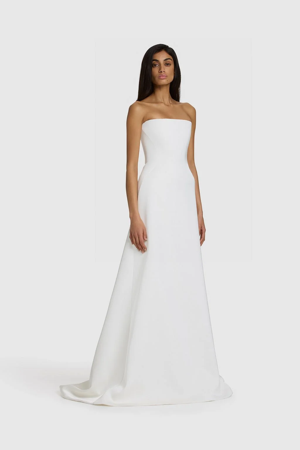 A work of art in KYHA Bride Walkley. Cut from fluid triacetate with a hint of stretch, Walkley’s A-line silhouette features a corseted bodice and liquid-like skirt that gracefully trails behind. The architectural hip detail combining sculptural shapi