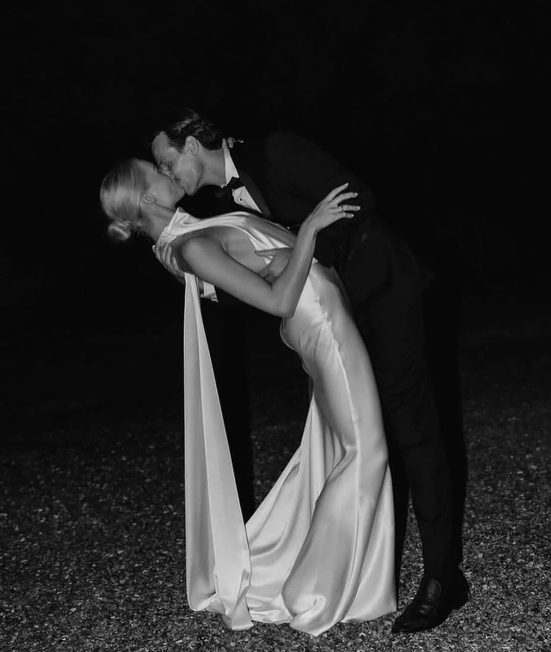 For minimalism with main character energy meet KYHA Bride Cameron. Fluid draping from the halter neck falls effortlessly into a relaxed silhouette. Crafted from satin triacetate, Cameron’s showstopping low back is celebrated via its long ties at the 