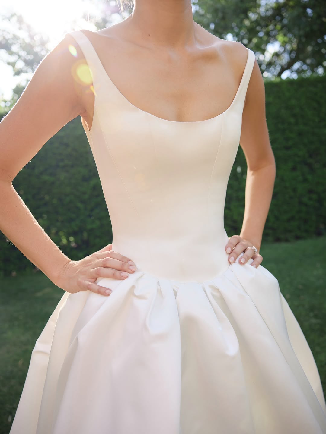 You’re a powerful presence in KYHA Bride Emery. A fresh take of a timeless silhouette, Emery balances sculpted precision with cloud-like airiness. A scoop-neck, corseted bodice flows into a gathered skirt, embodying KYHA’s signature play on structure