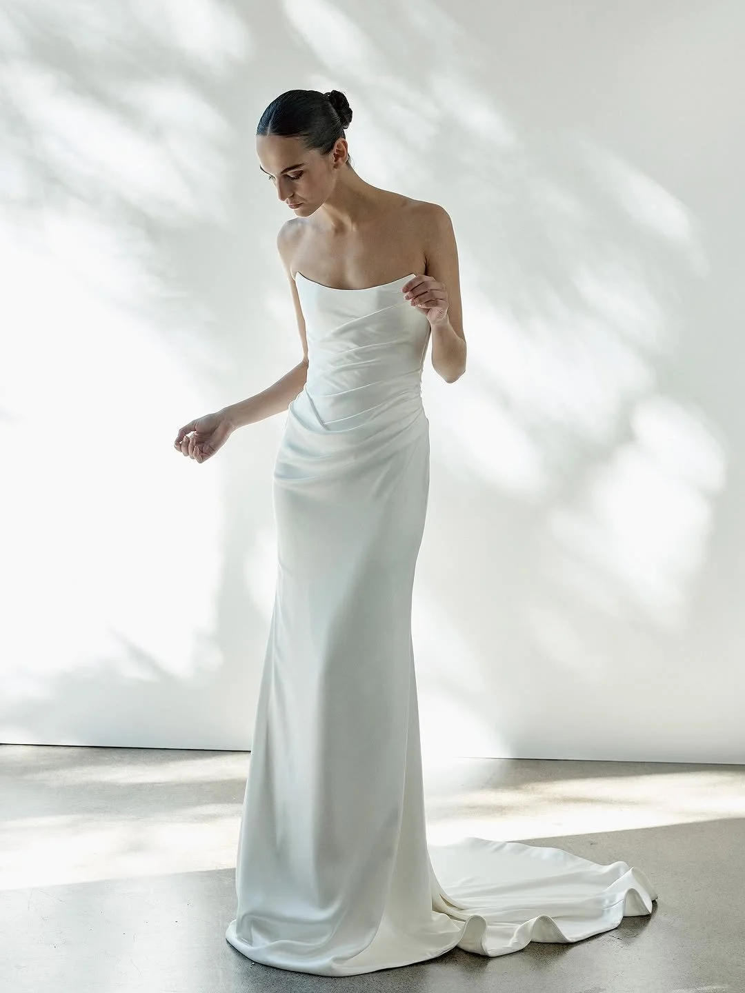 draping becomes an art form in KYHA Bride Iver. a structured, scoop neckline bodice cinches the waistline and a fit-and-flare skirt celebrates the female form. but the star of the showstopping KYHA Bride Iver is its draping. tight and directional acr