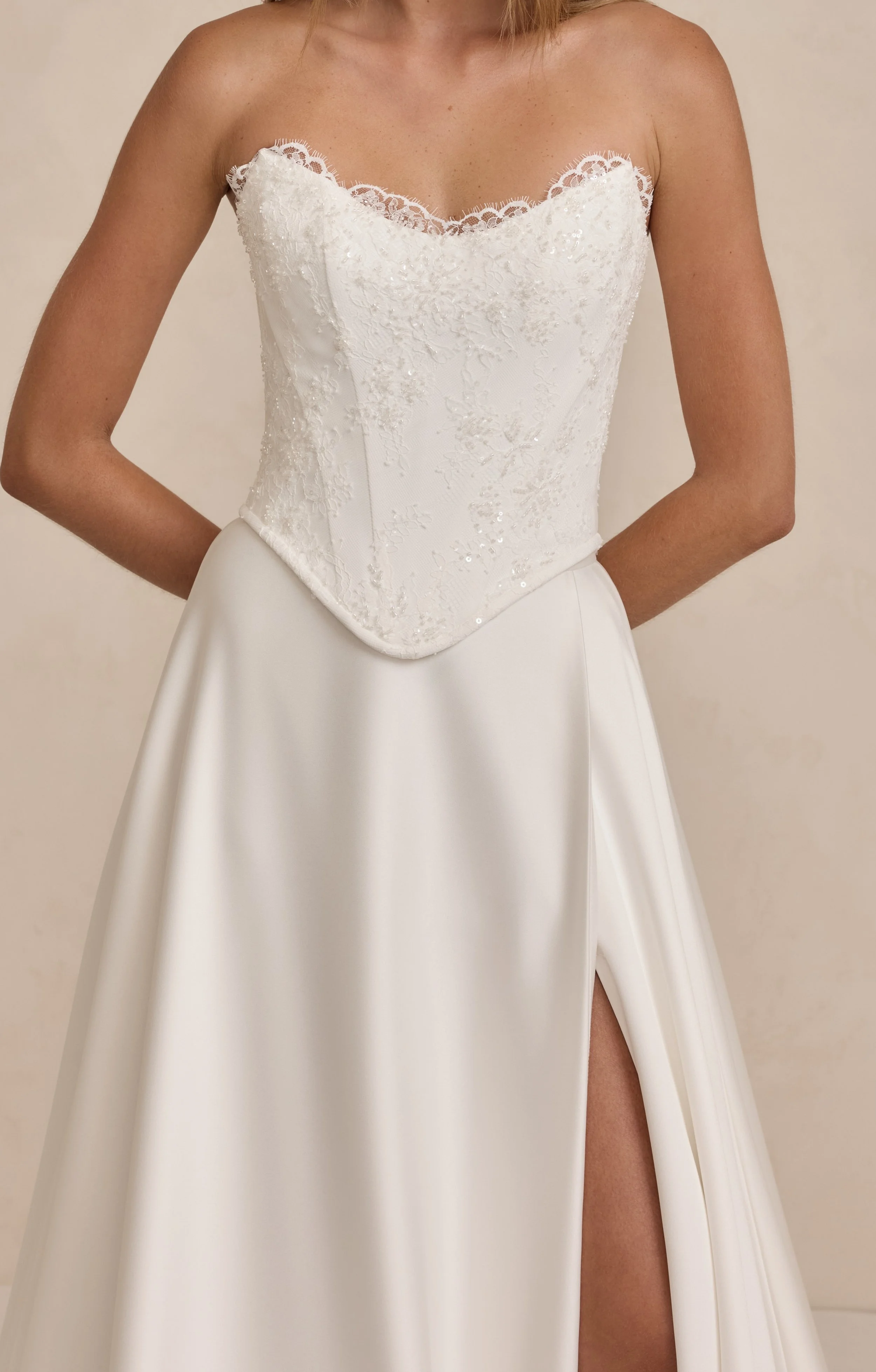 The MWL Landon is a stunning two piece dress, offering the elegance of a separate top and skirt for versatile styling. The top is crafted from delicate Blair lace and finished with the signature Blair trim, featuring the flattering Tate bodice shape.