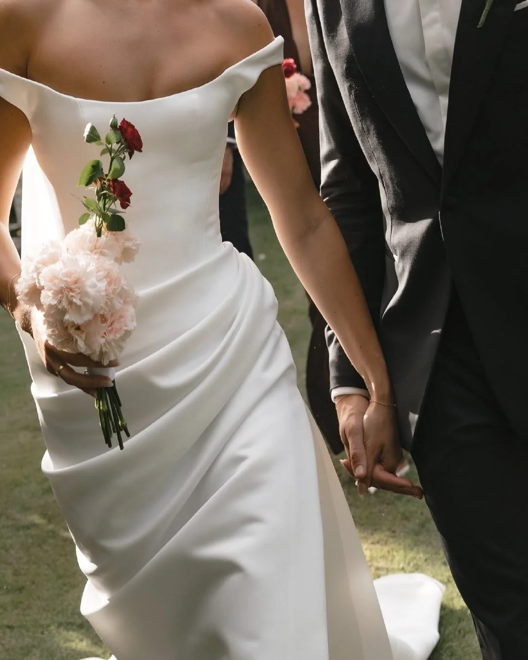 KYHA Bride Winton Gown is a modern bridal statement defined by clean lines and confident structure. featuring a sleek silhouette that skims the body, the Winton balances minimalist design with considered detailing for a refined, fashion-forward look.