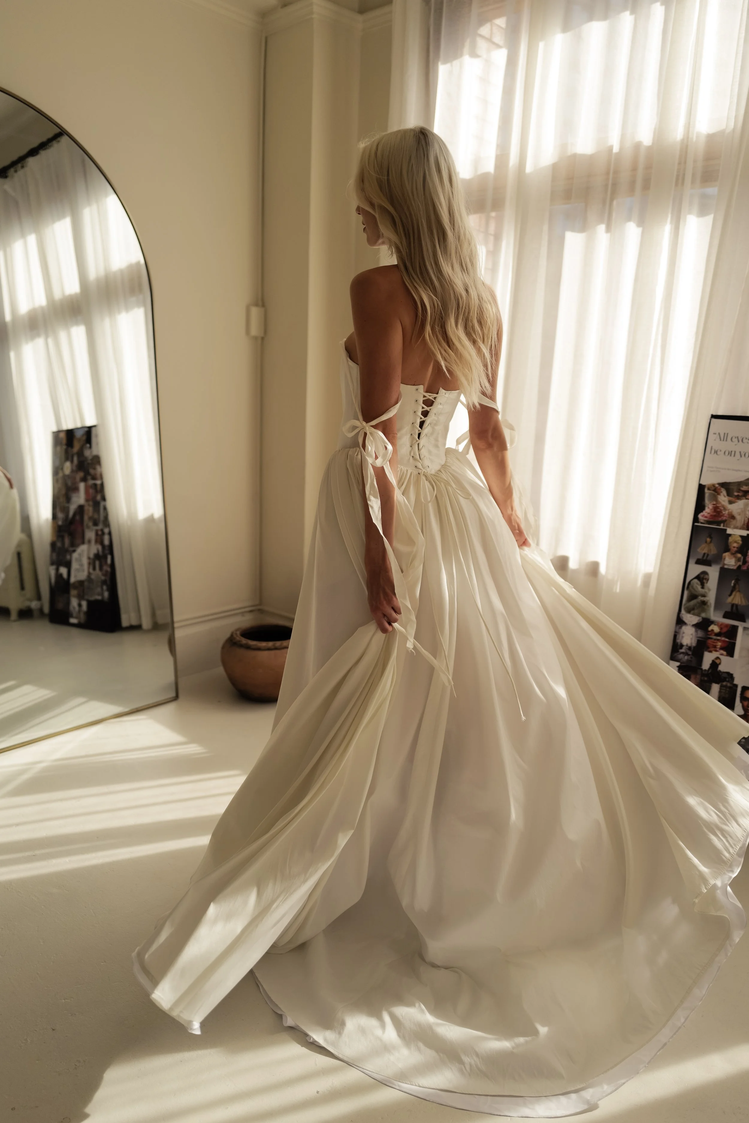 The & For Love Bridal Louis XVI gown is a striking blend of modern elegance and regal inspiration. Designed for the fashion-forward bride, this couture wedding dress features clean lines, refined structure, and a contemporary silhouette that feels bo