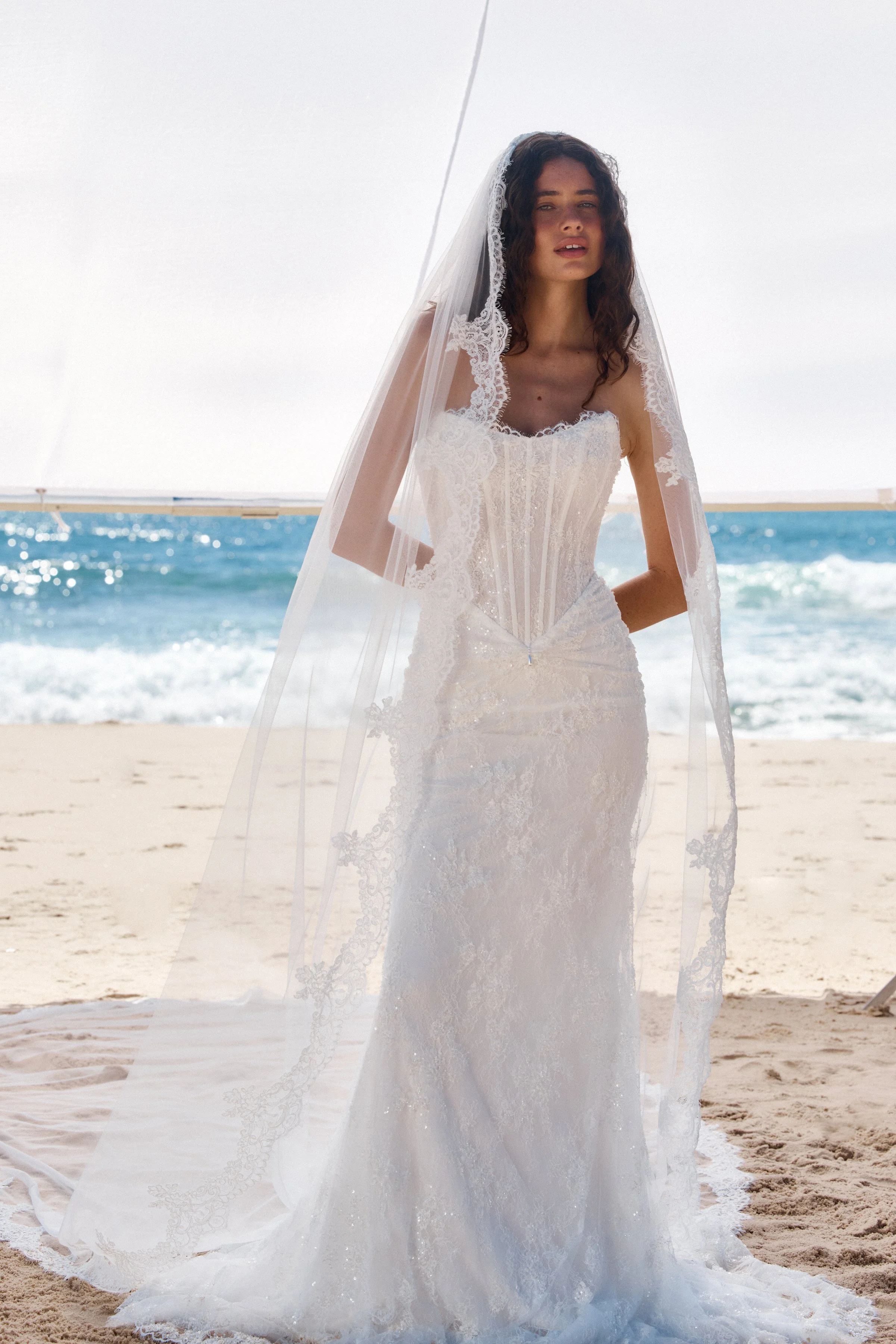 MWL Scout wrapped in our delicate new Scout lace, Scout is a love letter to refined romance. Her gently scooped bodice is subtly elongated for a flattering, feminine shape, structured with layers of buckram and fine boning to offer both support and a